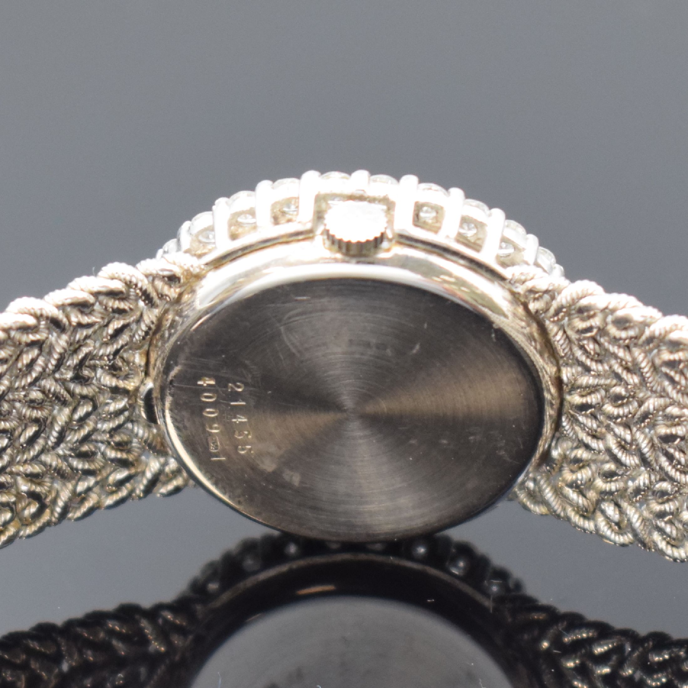 Detail d: CHOPARD Damenarmbanduhr in WG 750/000 mit Diamanten Referenz 4009 1, Schweiz 1970er Jahre, Handaufzug, Geh. an orig. Flechtband 750/000, Boden ...