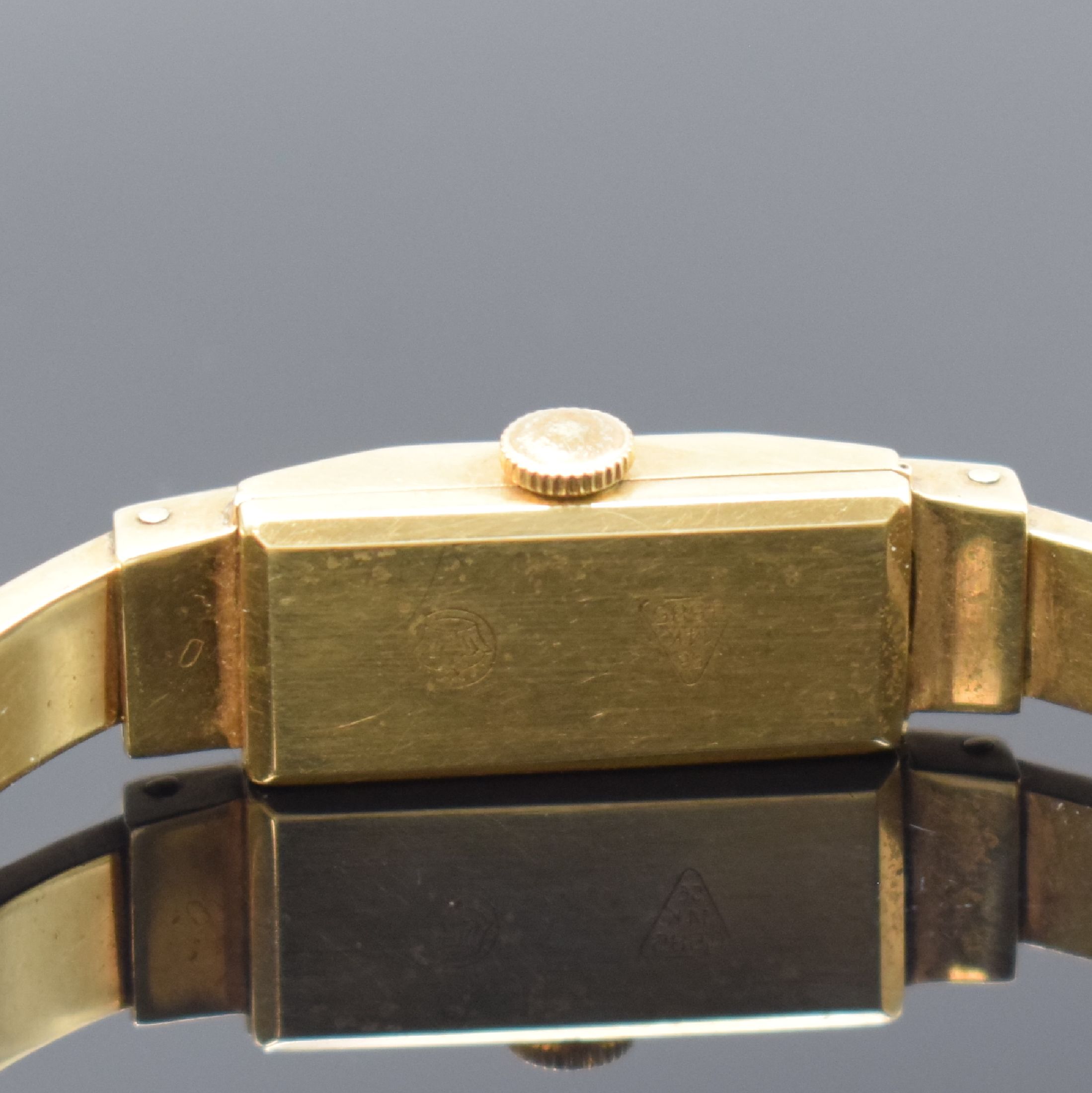 Detail c: HABMANN Damenspangenuhr in GG 585/000, Schweiz um 1940, Handaufzug, Boden aufgedr., silb. Zifferbl. pat./fl., gold. Ind. u. arab. Zahlen, gold. ...
