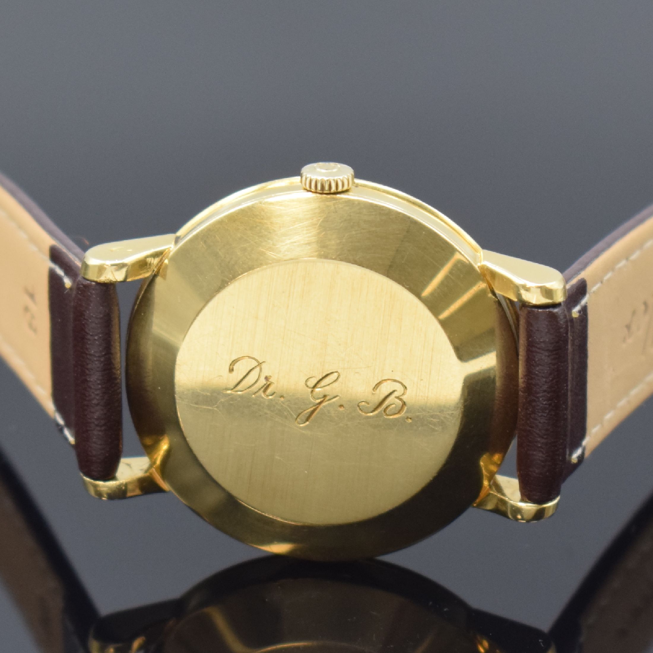 Detail c: OMEGA Herrenarmbanduhr Referenz 2898S.C in GG 750/000, Schweiz um 1958, Automatik, 3-teil. Geh., Boden m. Monogramm u. Glasrand aufgedr., silb. ...