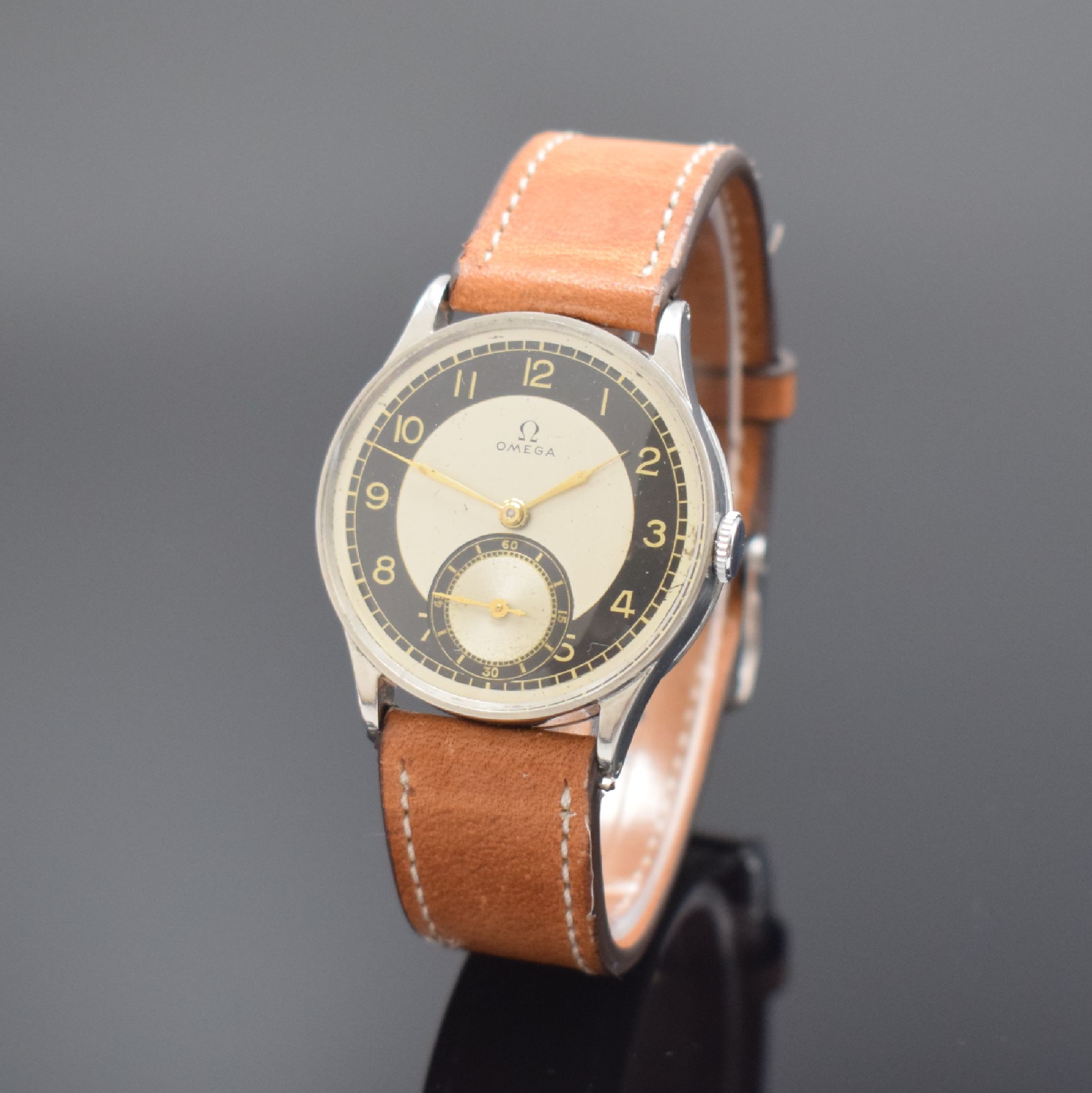 OMEGA Armbanduhr in Stahl Kaliber 26.5 SOB T2, Schweiz um 1939, Handaufzug, 2-teil. Gehäuse, Boden aufgedr., 2-farb. Zifferbl. m. arab. Zahlen, ...