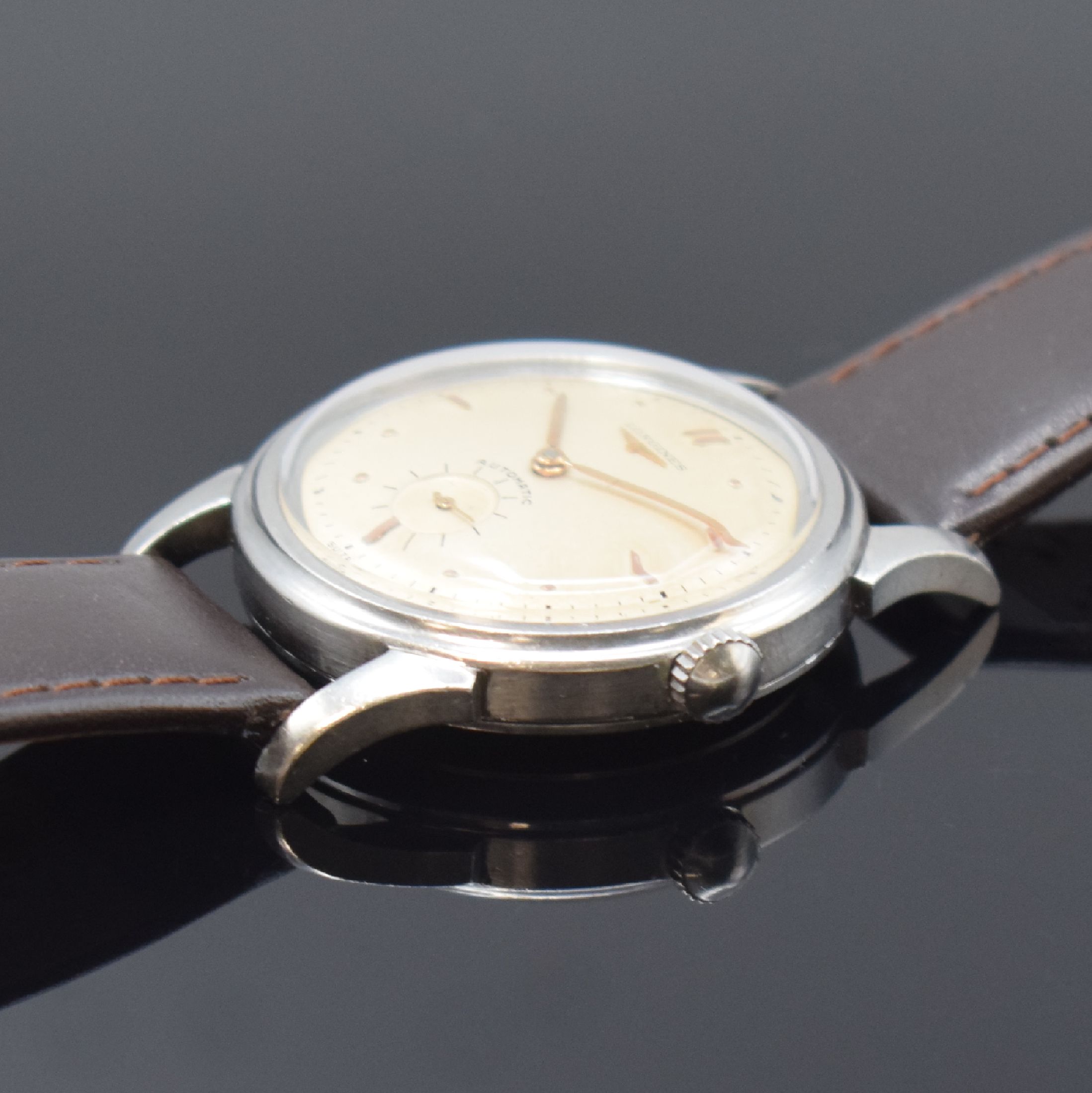 Detail b: LONGINES Herrenarmbanduhr in Stahl mit dem ersten in 1945 eingeführten Automatikwerk Kaliber 22A, Schweiz lt. Stammbuchauszug verk. 1952, Ref. 6000, ...