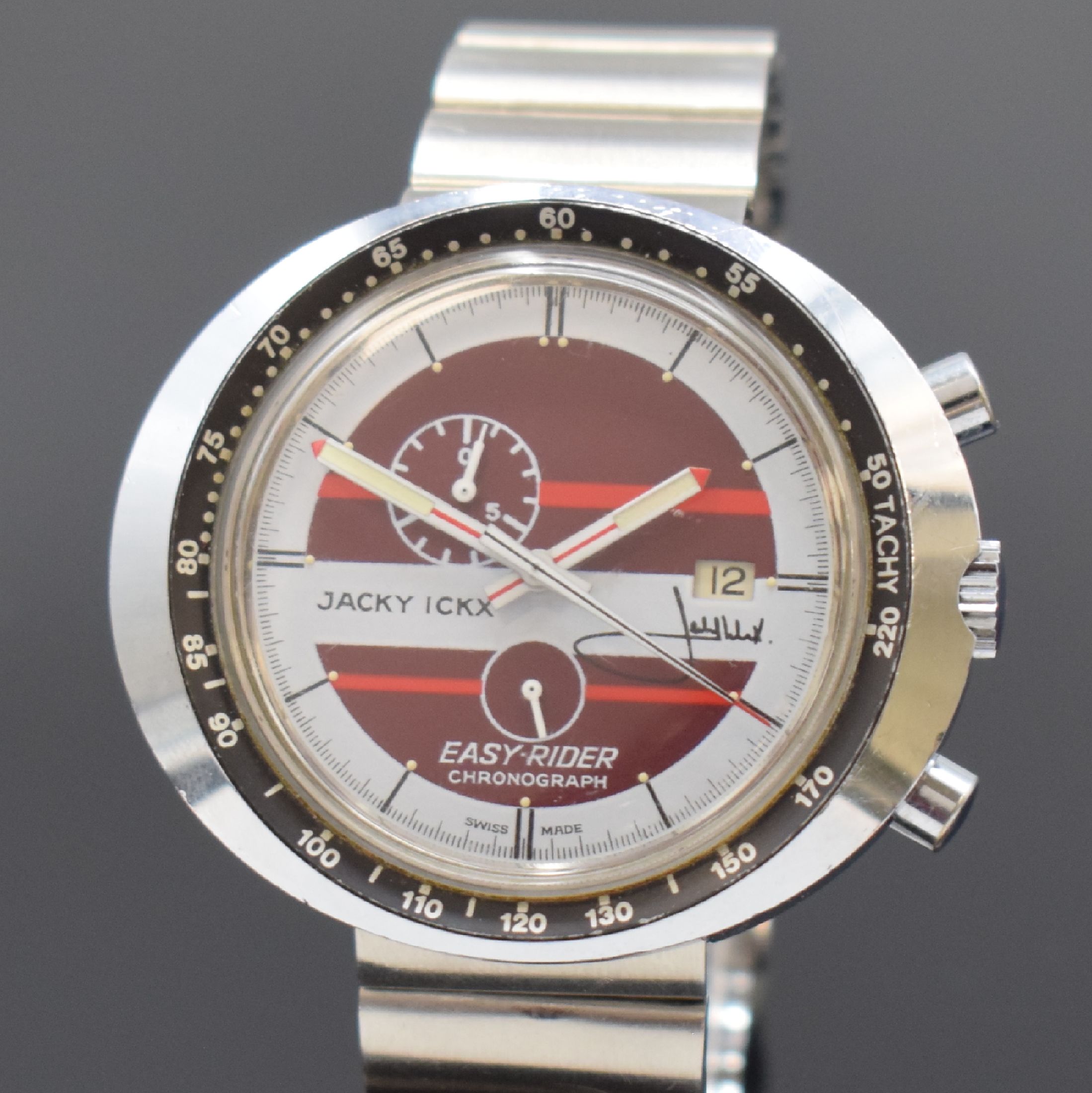 Detail a: HEUER / JACKY ICKX Easy-Rider Armbanduhr mit Chronograph an Heuer Stahlband, Schweiz um 1970, Handaufzug, verchromtes Stülpgehäuse, Lünette m. ...