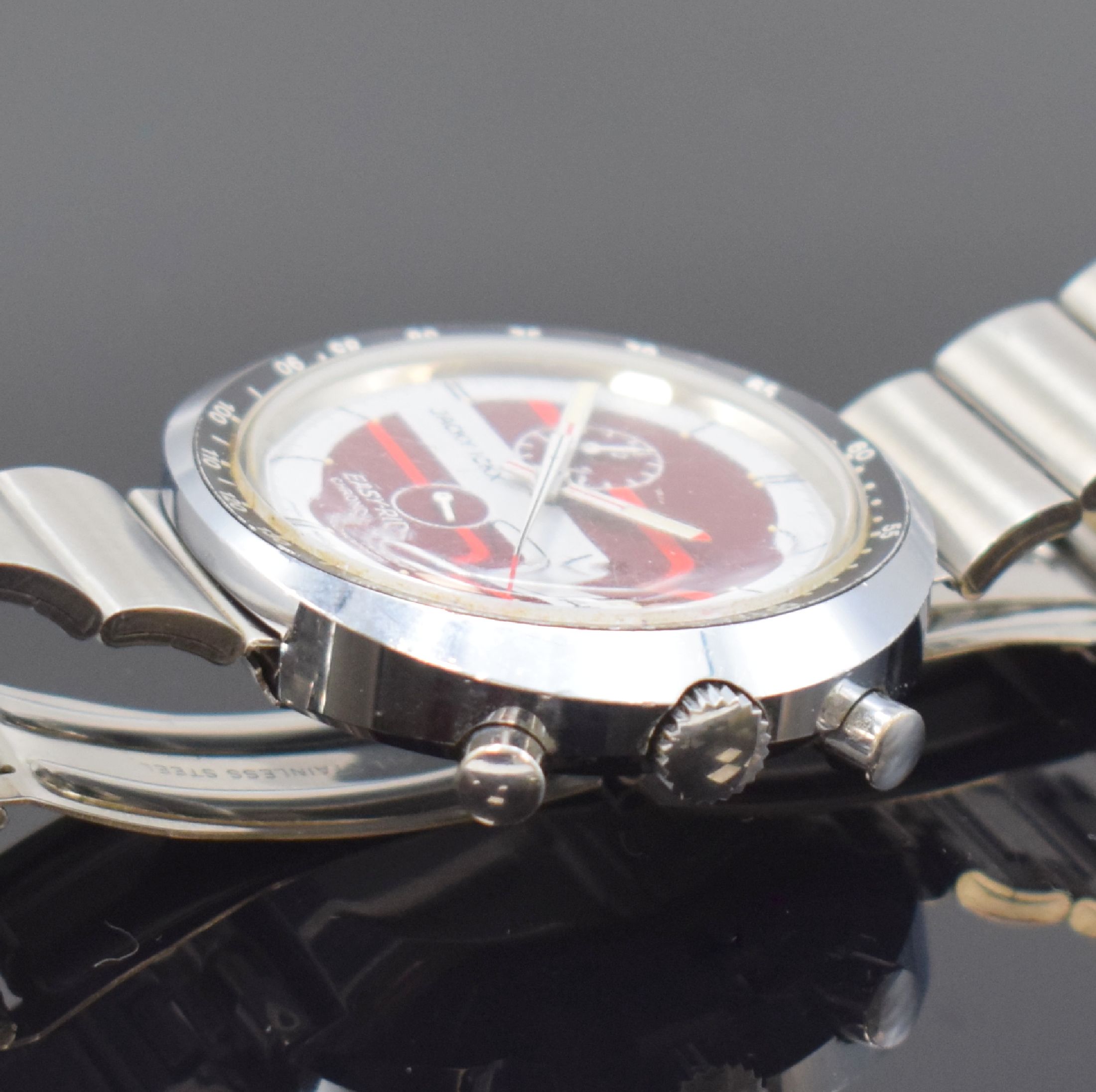 Detail c: HEUER / JACKY ICKX Easy-Rider Armbanduhr mit Chronograph an Heuer Stahlband, Schweiz um 1970, Handaufzug, verchromtes Stülpgehäuse, Lünette m. ...
