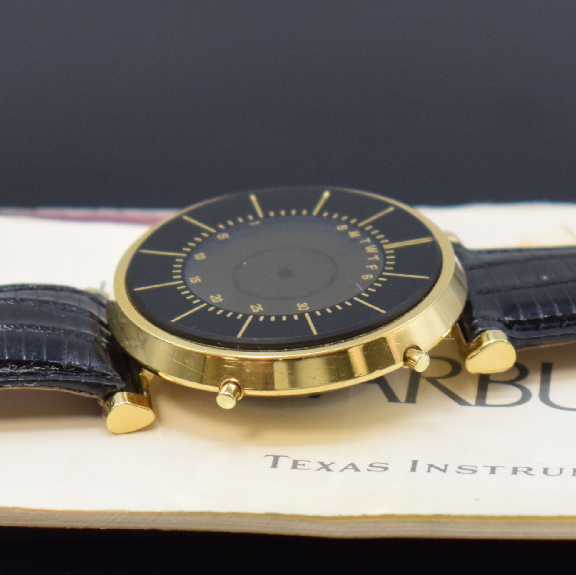 Detail b: TEXAS INSTRUMENTS Starburst erste vollelektronische, seltene und multifunktionale Quarz-Analog-Armbanduhr mit original Anleitung, USA um 1980, quarz, ...