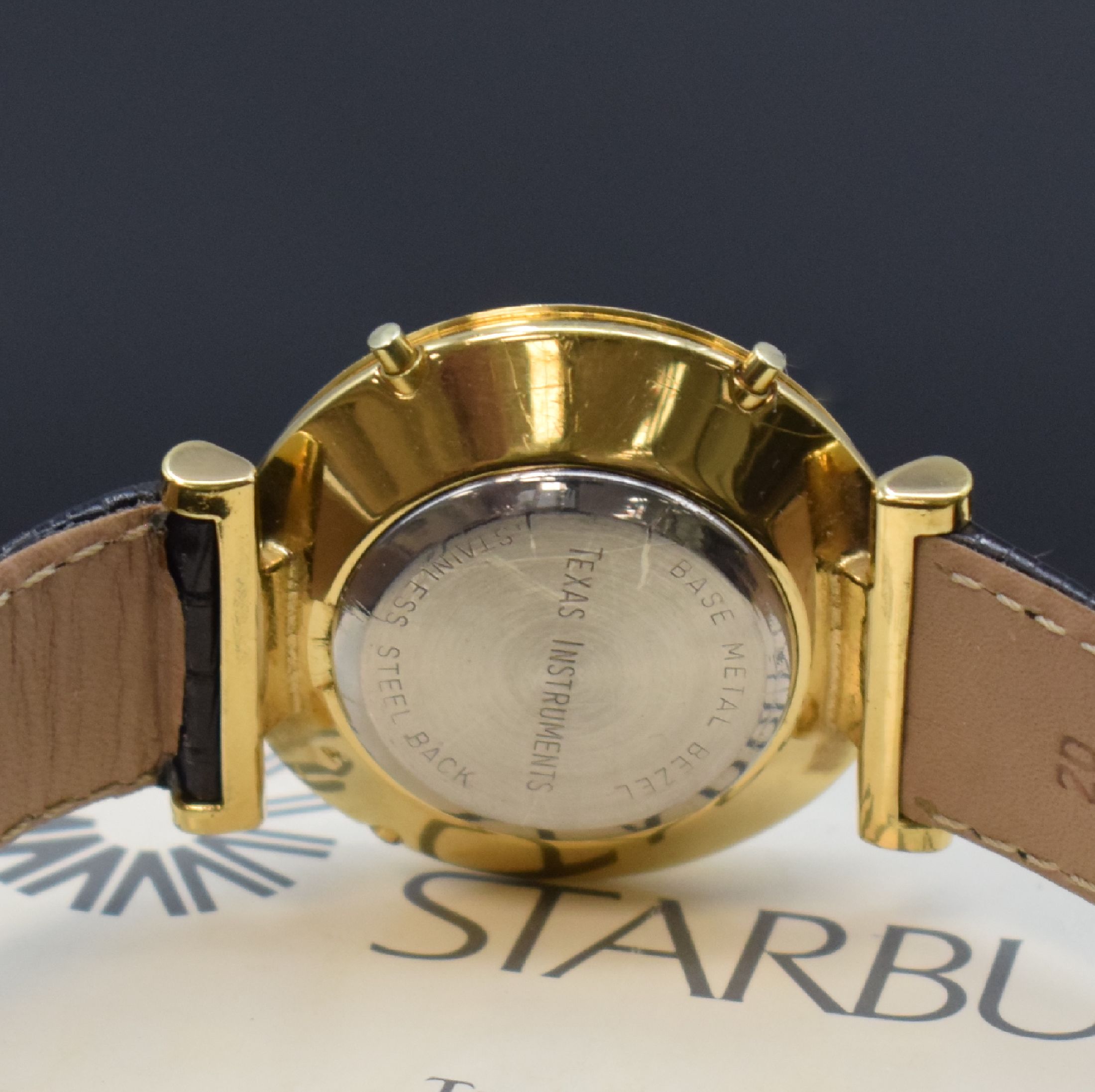 Detail c: TEXAS INSTRUMENTS Starburst erste vollelektronische, seltene und multifunktionale Quarz-Analog-Armbanduhr mit original Anleitung, USA um 1980, quarz, ...
