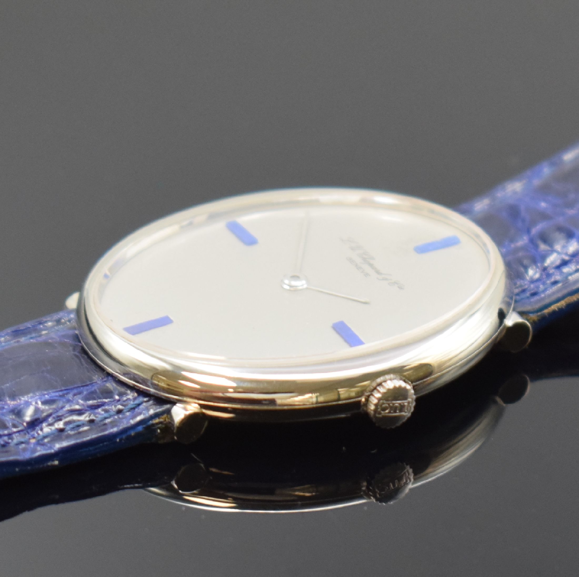 Detail b: CHOPARD Referenz 2031 Armbanduhr in WG 750/000, Schweiz um 1970, Handaufzug, 2- tlg. Geh., Glasrand aufgedr., silb. Zifferbl. m. Lapislazuli-Ind., ...