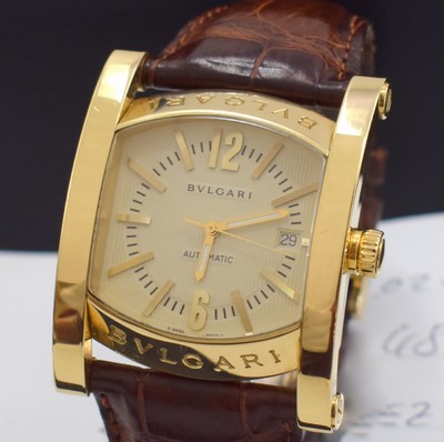 26632610a - BULGARI big 18k yellow gold wristwatch model Assioma reference AS 48 G, self winding, leather strap with 18k yellow gold gold butterfly clasp, case back 6-times screwed down, stripe engine-turned dial with raised indices, display of hours, minutes, sweep seconds & date, measures approx. 38 x 48 mm, original box & warranty papers, condition 2
