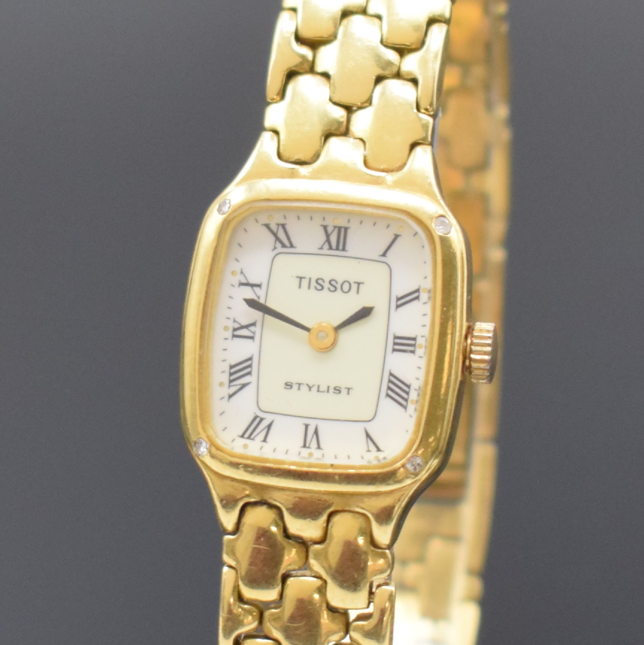 Detail a: TISSOT Damenarmbanduhr in GG 750/000, Schweiz um 1985, quarz, 2-teil. Gehäuse, Boden aufgedr., 2-farb. Zifferbl. m. röm. Zahlen, schwarze Zeiger, ...