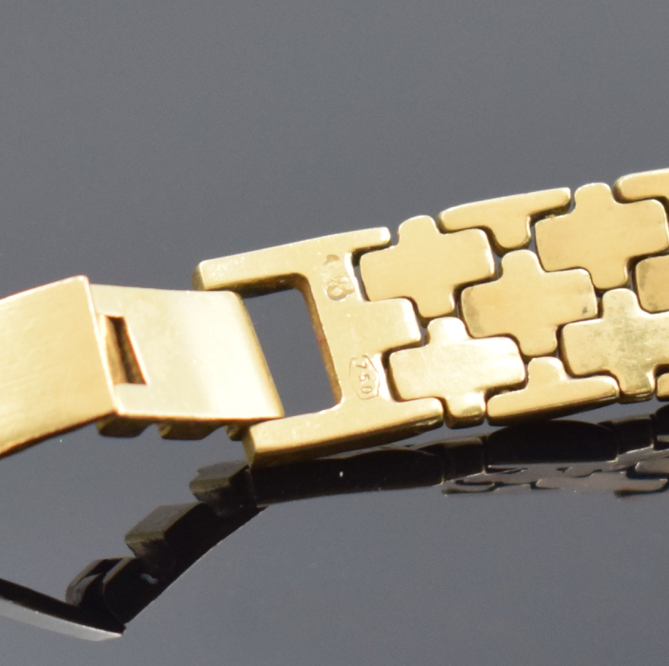 Detail b: TISSOT Damenarmbanduhr in GG 750/000, Schweiz um 1985, quarz, 2-teil. Gehäuse, Boden aufgedr., 2-farb. Zifferbl. m. röm. Zahlen, schwarze Zeiger, ...