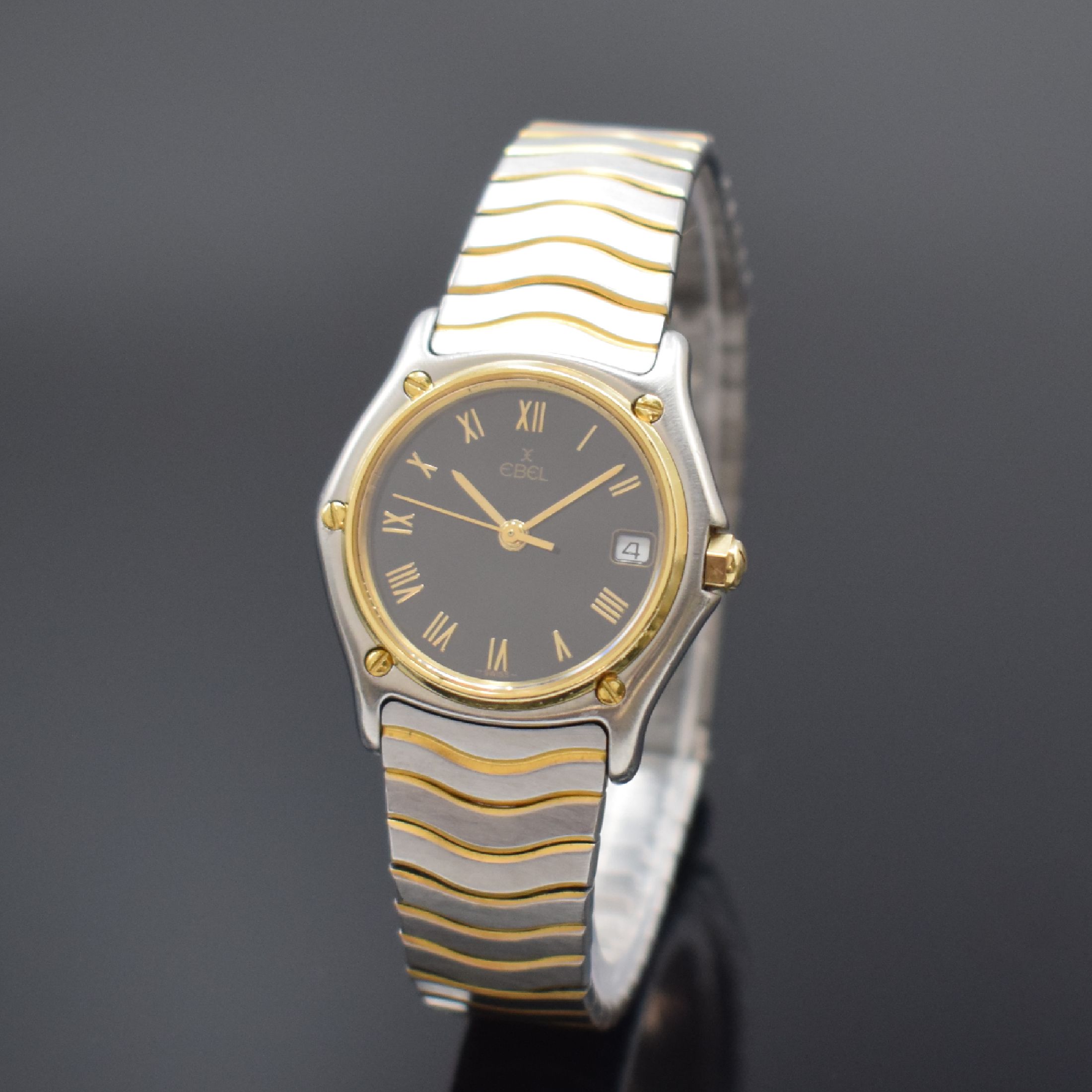 EBEL Damenarmbanduhr Classic Wave in Stahl/Gold Referenz 183908, Schweiz um 1990, quarz, Lünette gegen Geh. 5-fach verschr. (1 Schraube def.), orig. ...