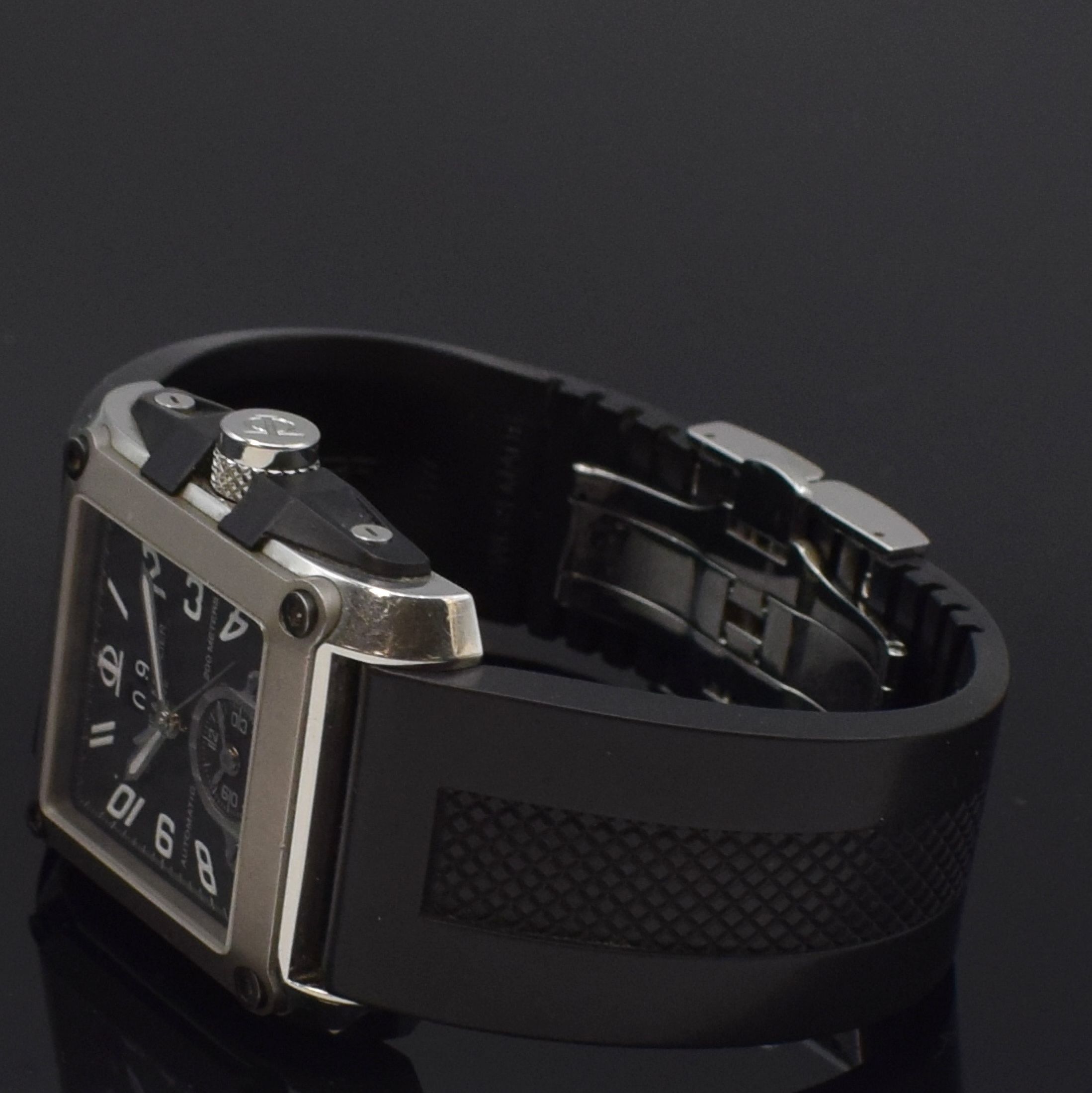 Detail c: BAUME & MERCIER Herrenarmbanduhr Model Dual Time Referenz 65590, Schweiz um 2005, Automatik, beids. vergl. Edelstahlgeh., orig. Kautschukbd. m. dopp. ...