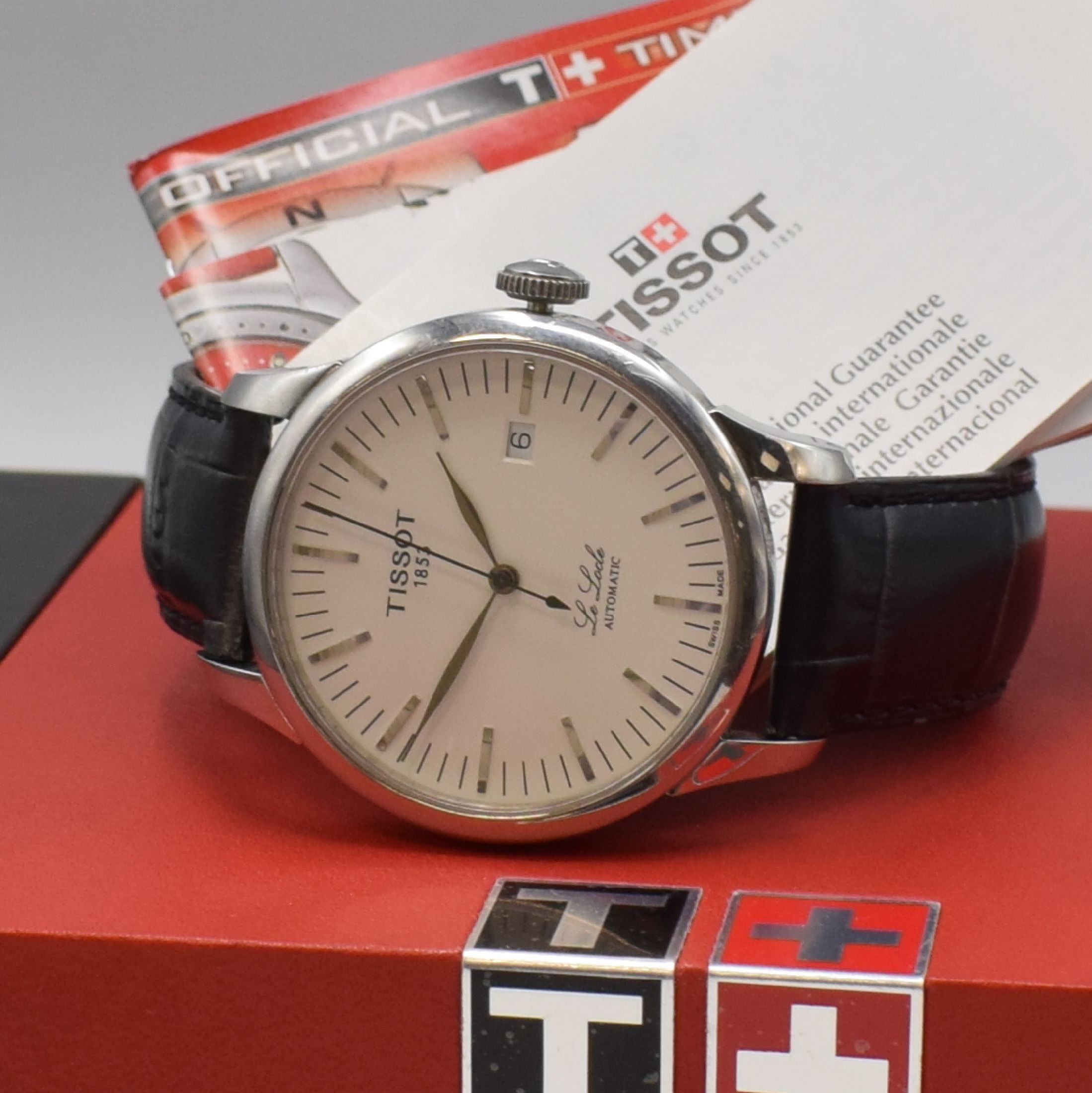 Detail a: TISSOT Le Locle Herrenarmbanduhr, Schweiz um 2006, Automatik, beids. vergl. Edelstahlgeh.,Boden und Glasrand aufgedr., Lederbd. def. / zu ers., orig. ...
