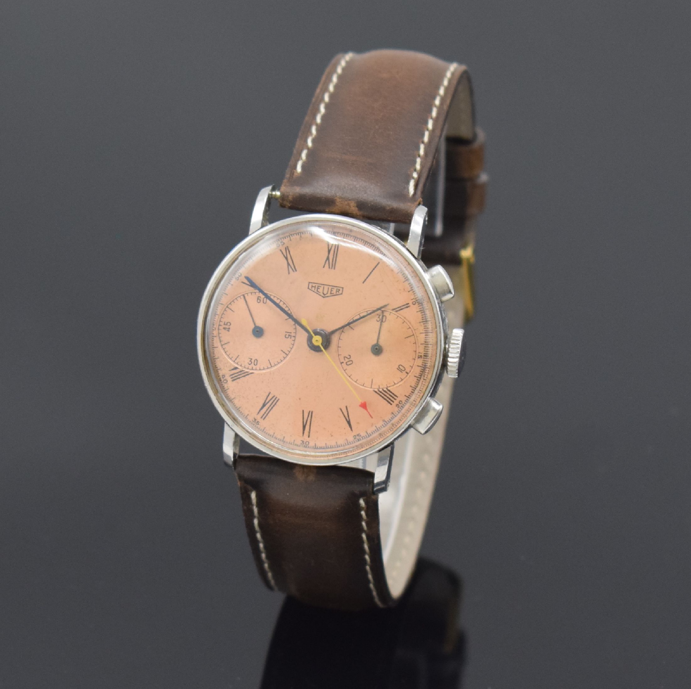 HEUER früher Schaltradchronograph in Stahl Referenz 2402, Handaufzug, Schweiz um 1942, 3-teil. Geh., Boden und Glasrand aufgedr., kupferfarb. ...
