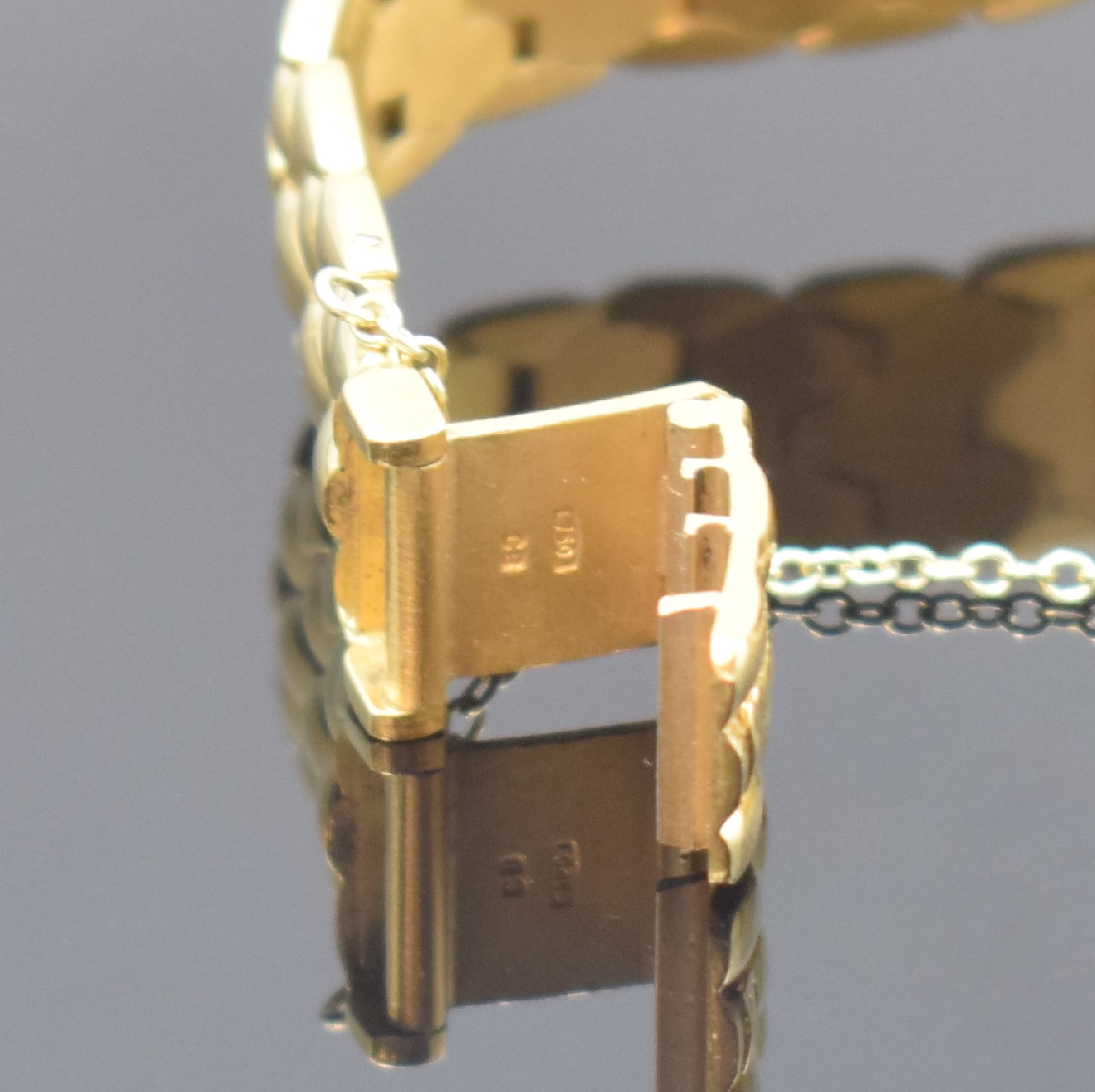 Detail b: BUCHERER Damenarmbanduhr in GG 750/000, Schweiz um 1990, quarz, 2-teil. Gehäuse, Boden aufgedr., Lünette aufw. m. Diamanten bes., Gliederbd. in GG ...
