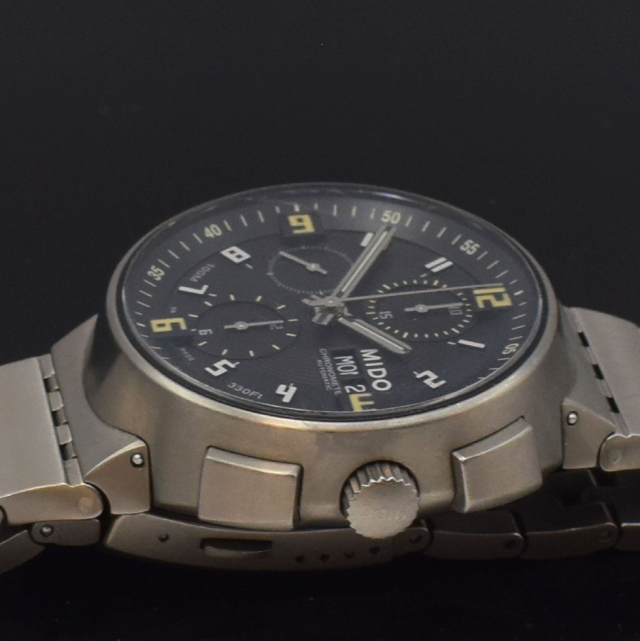 Detail h: MIDO All Dial Herrenarmbanduhr mit Chronograph Referenz 8360-8, Schweiz um 2015, Titangehäuse inkl. Titanband m. Faltschl., schwarzes Zifferbl. m. ...