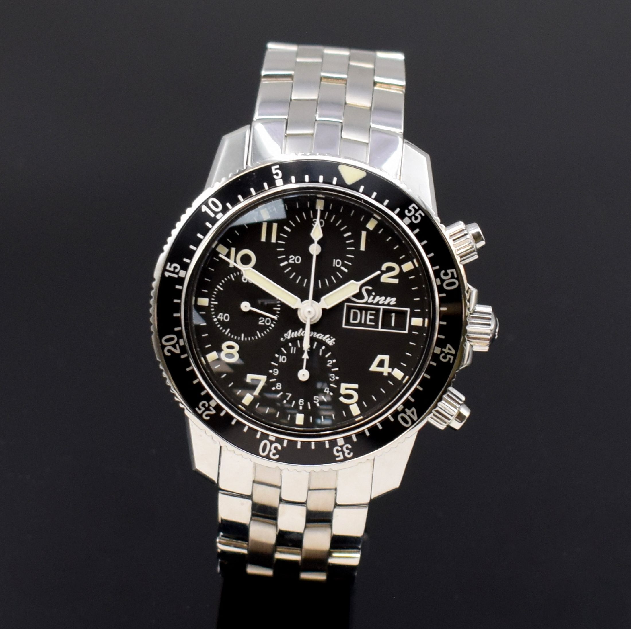Detail a: SINN Herrenarmbanduhr mit Chronograph Referenz 103, Deutschland um 2015, Automatik, verschr. Geh. in Edelstahl inkl. orig. Band m. dopp. Faltschl., ...