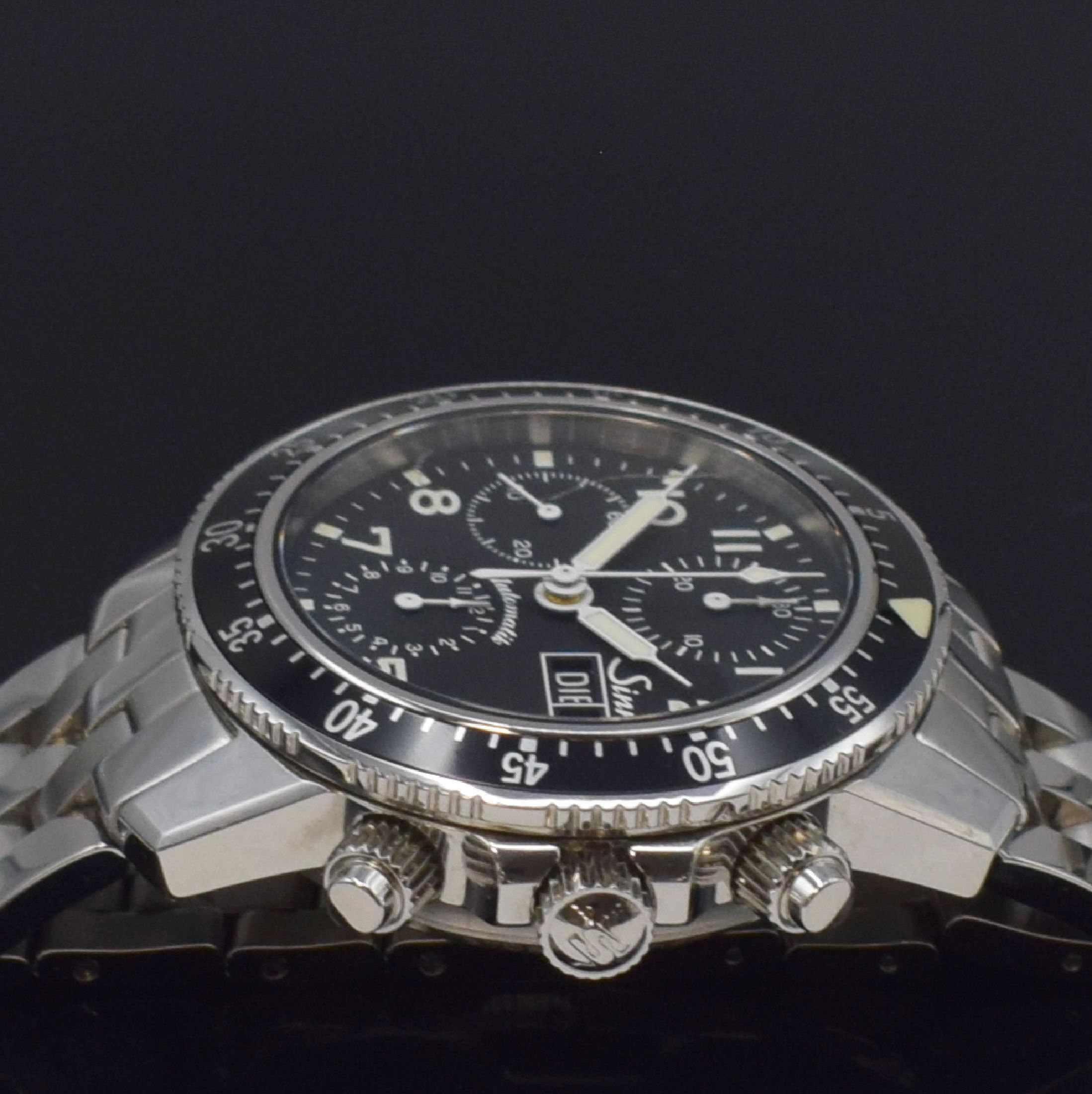 Detail f: SINN Herrenarmbanduhr mit Chronograph Referenz 103, Deutschland um 2015, Automatik, verschr. Geh. in Edelstahl inkl. orig. Band m. dopp. Faltschl., ...
