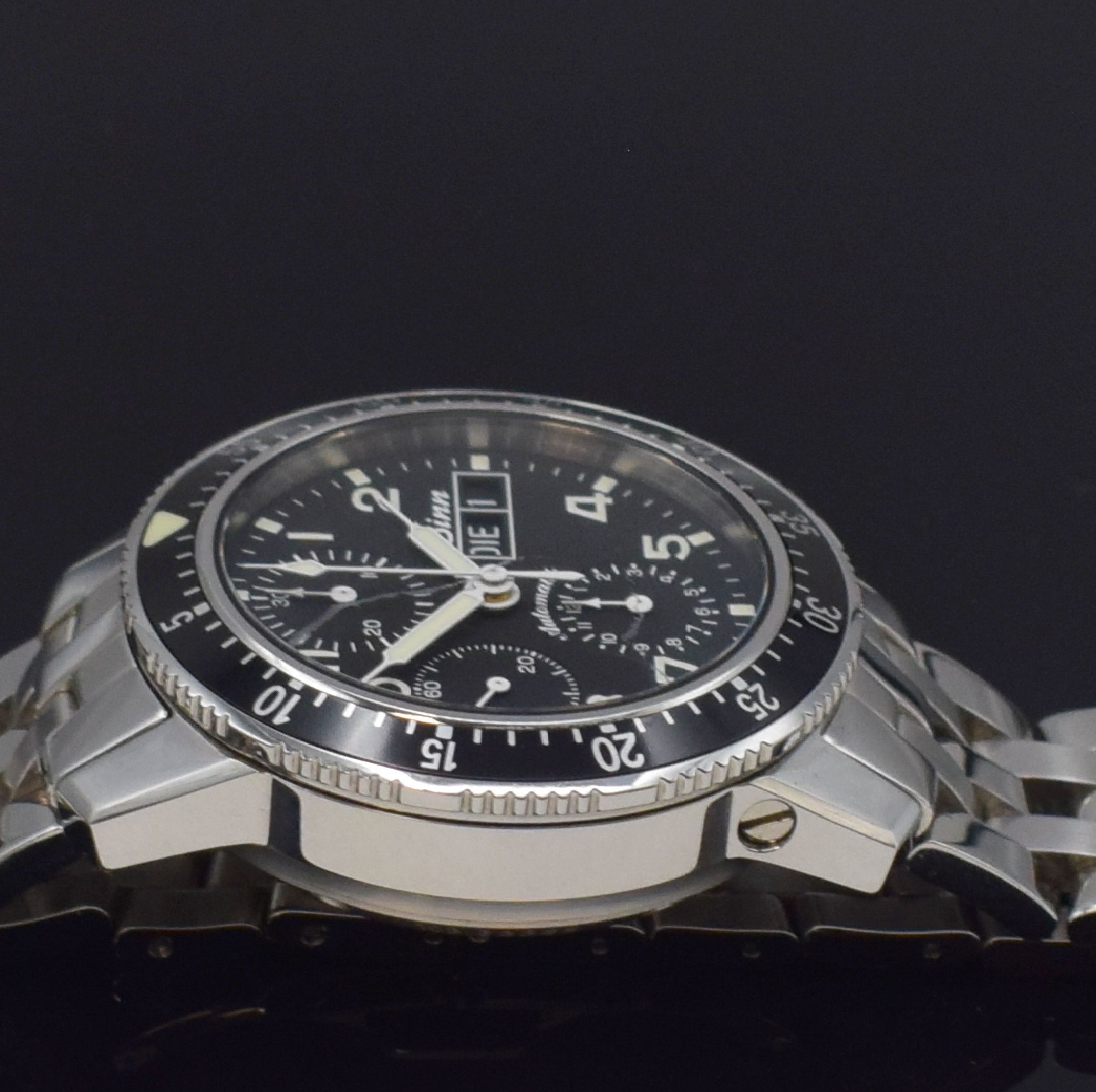 Detail g: SINN Herrenarmbanduhr mit Chronograph Referenz 103, Deutschland um 2015, Automatik, verschr. Geh. in Edelstahl inkl. orig. Band m. dopp. Faltschl., ...
