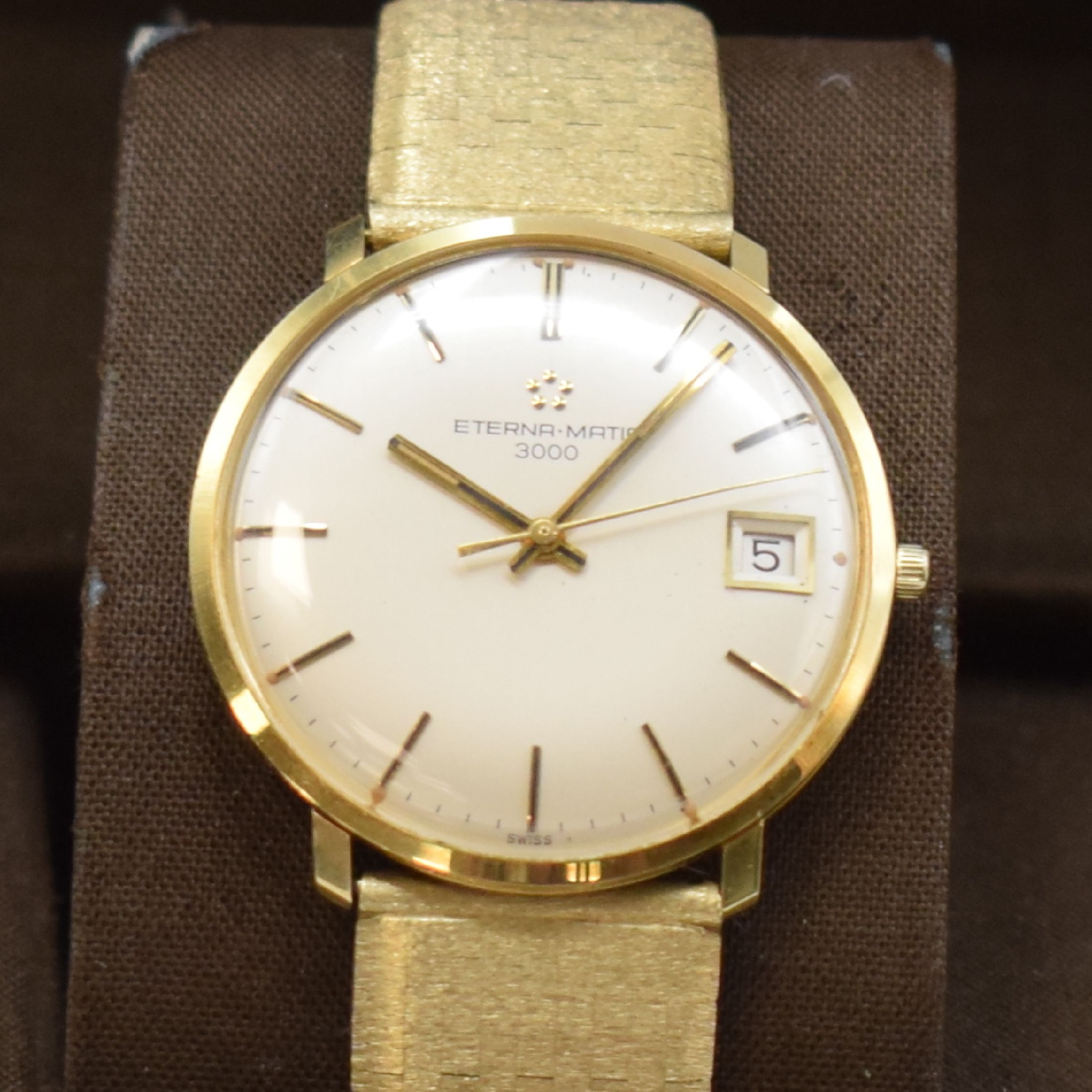 Detail a: ETERNA-MATIC Herrenarmbanduhr in GG 750/000 mit neutralem Goldband in GG 585/000, Schweiz um 1965, Automatik, 3-teil. Gehäuse, Boden u. Glasrd. ...
