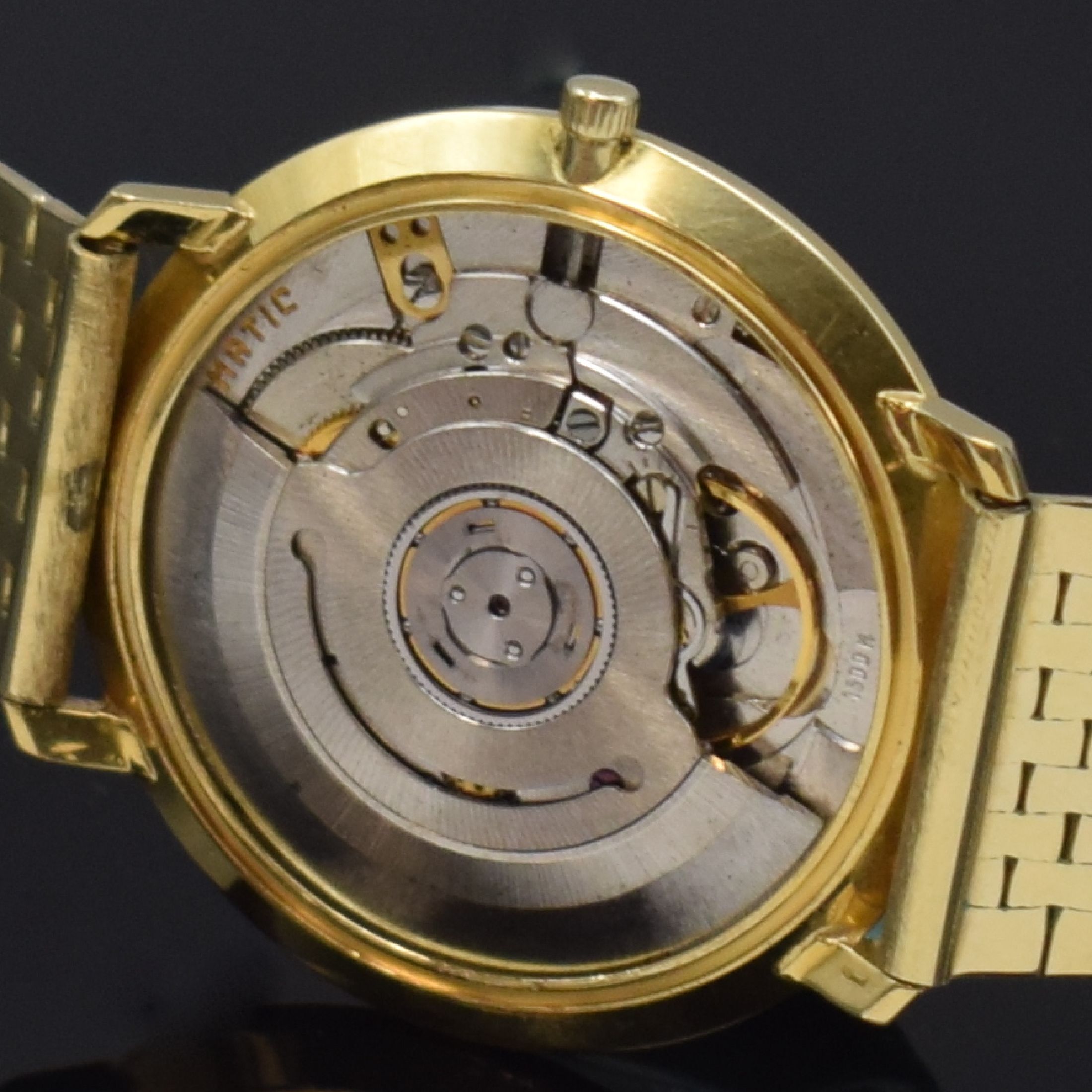 Detail e: ETERNA-MATIC Herrenarmbanduhr in GG 750/000 mit neutralem Goldband in GG 585/000, Schweiz um 1965, Automatik, 3-teil. Gehäuse, Boden u. Glasrd. ...
