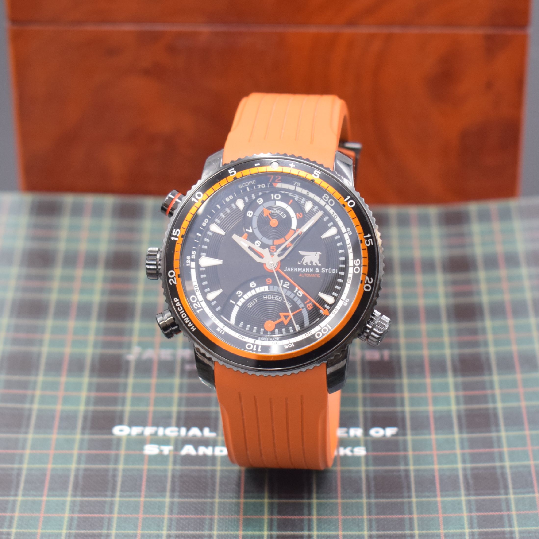 JAERMANN & STÜBI Golferuhr Black Iron, Automatik, Schweiz um 2015, PVD beschichtetes Edelstahlgeh. inkl. orig. Kautschukband m. orig. Faltschl., ...