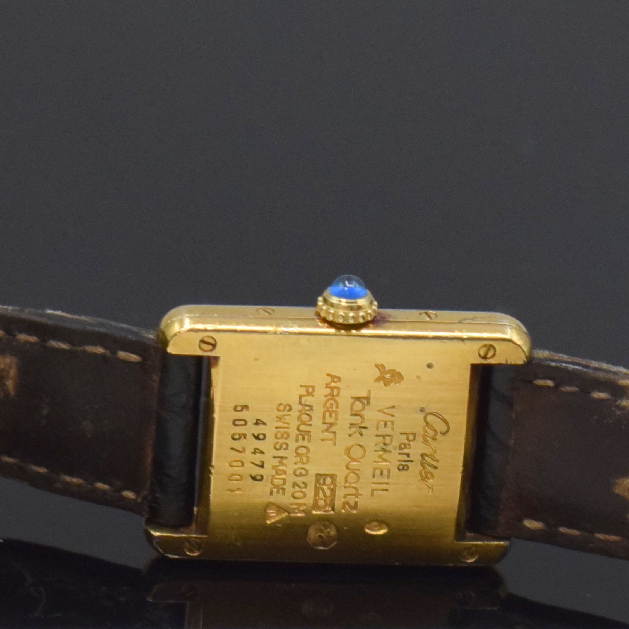 Detail d: CARTIER Tank Damenarmbanduhr in Vermeil, Schweiz um 1990, quartz, 4-fach verschr. Geh. pat., orig. Lederband m. verg. orig. Faltschl., Mineralglas ...