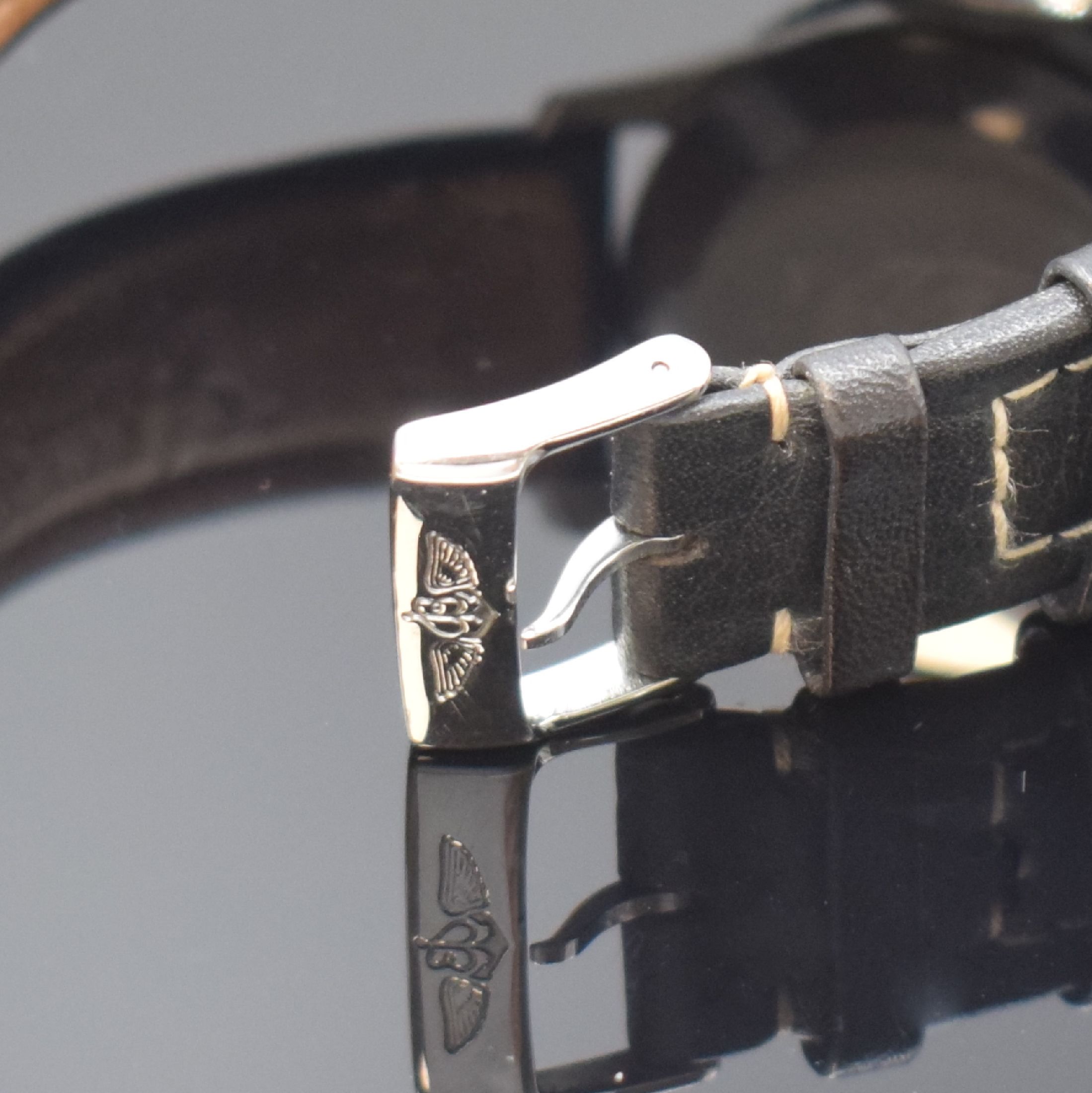 Detail b: BREITLING Schaltradchronograph Navitimer für die Irakische Luftwaffe, Handaufzug, Schweiz um 1960, 3-teil. Edelstahlgeh., Boden m. irakischem ...