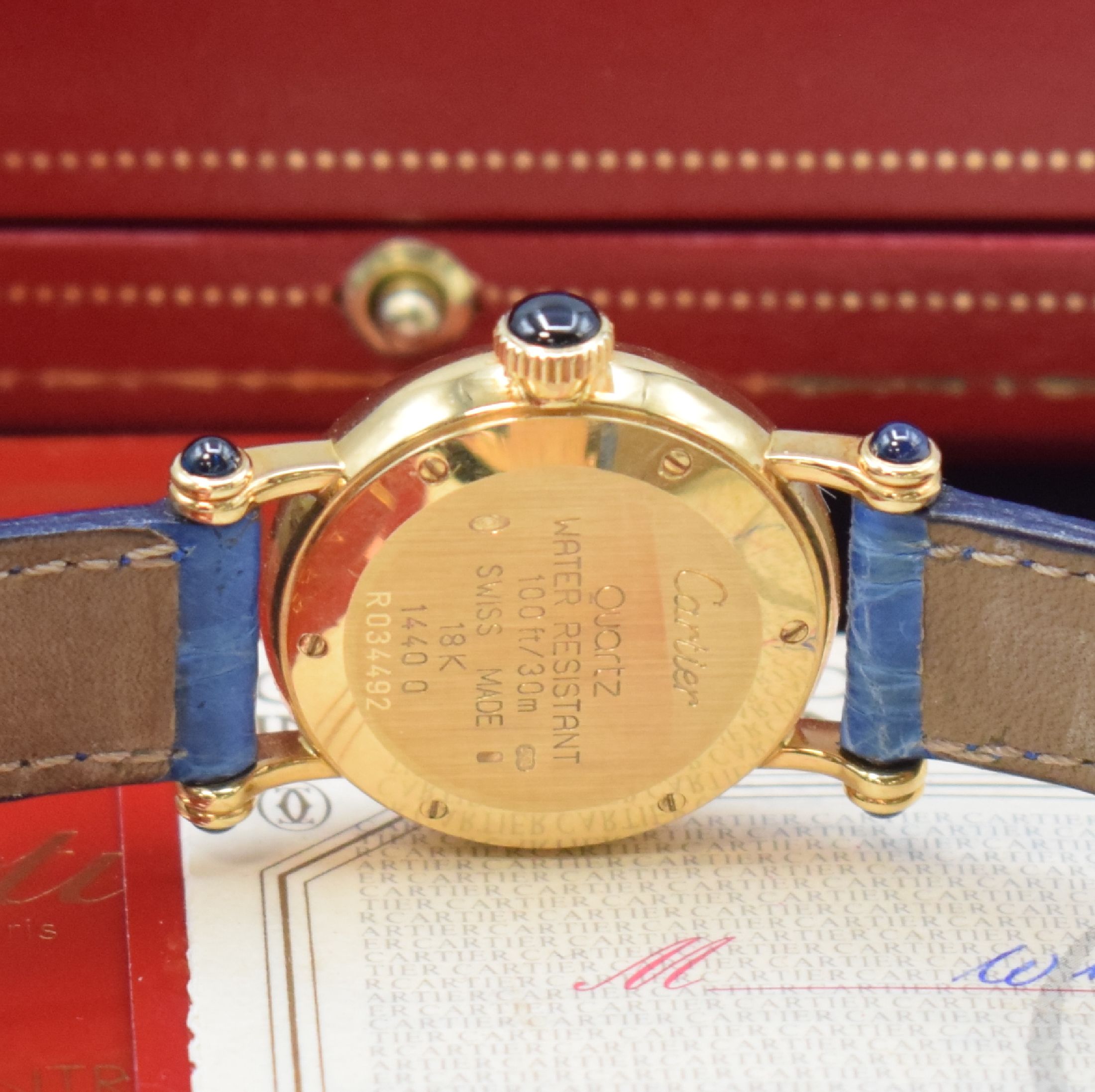 Detail d: CARTIER Diabolo Damenarmbanduhr in GG 750/000 Referenz 1440 0, quarz, Boden 6-fach verschr., orig. Lederband inkl. orig. GG 750/000 Faltschl., ...