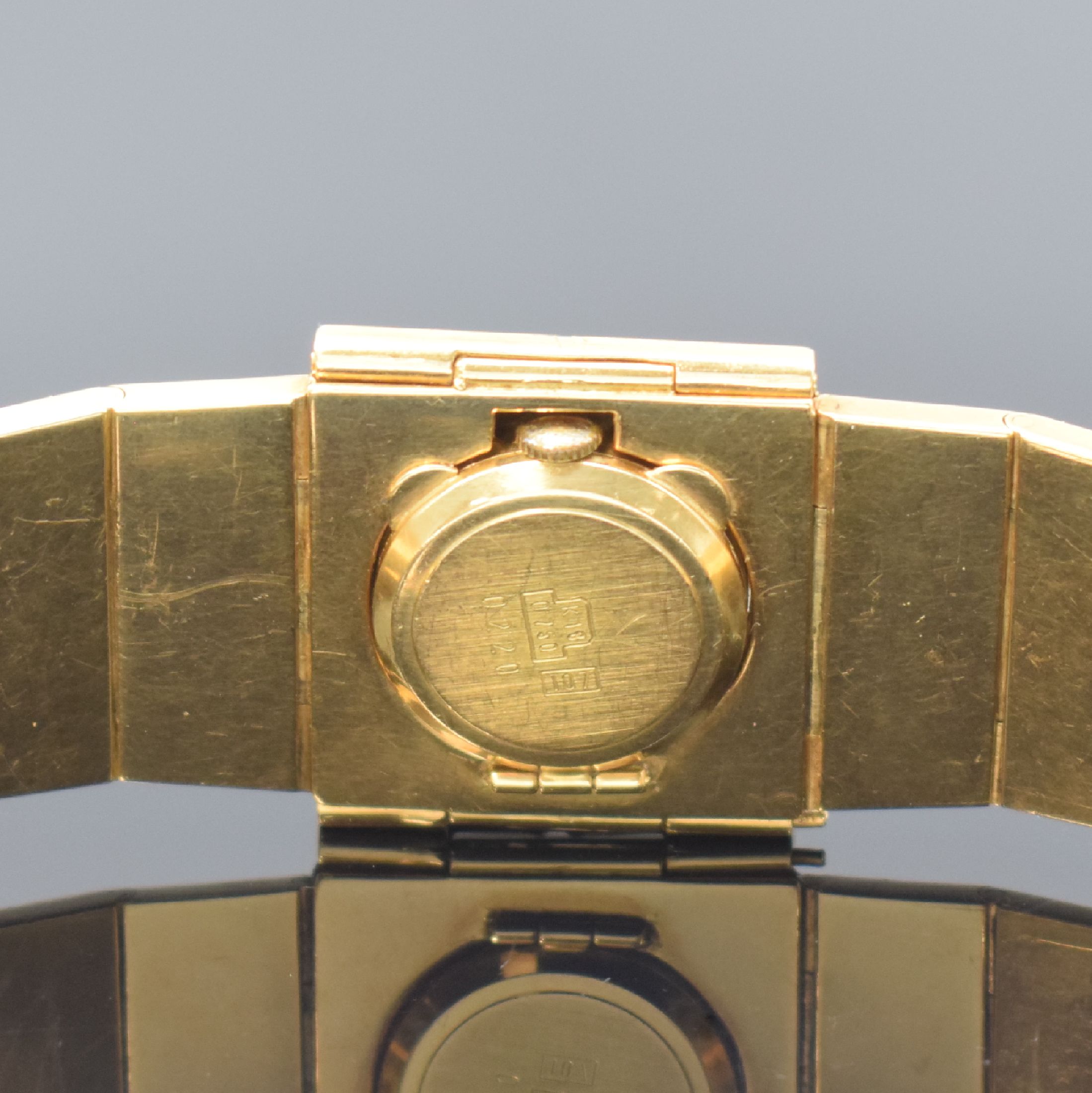 Detail d: Ausgefallene Damenarmbanduhr in GG 750/000 mit Omega-Werk, Sonderanfertigung, Werk Schweiz um 1961, Handaufzug, ausklappbares Gehäuse mit Omega Kal. ...