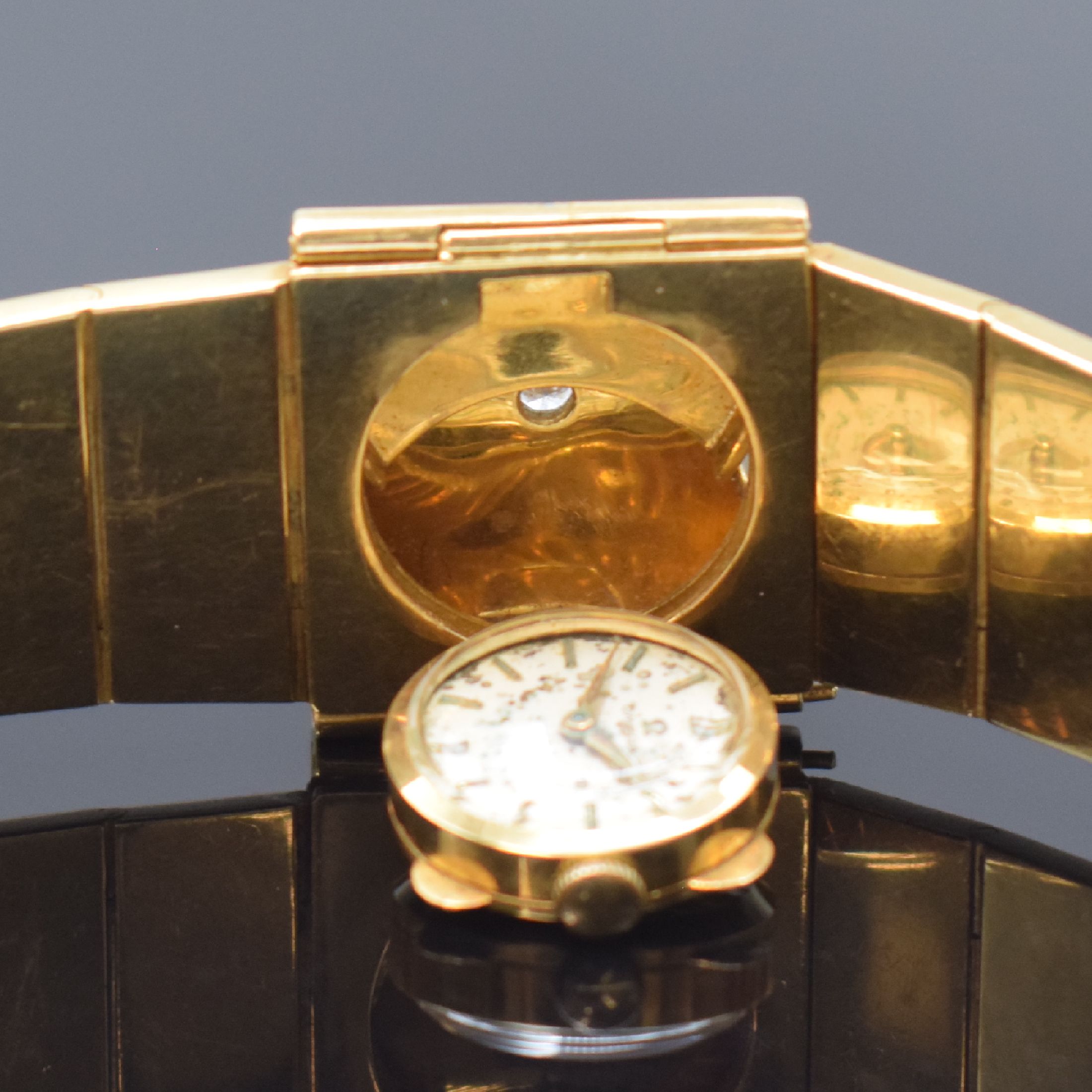 Detail f: Ausgefallene Damenarmbanduhr in GG 750/000 mit Omega-Werk, Sonderanfertigung, Werk Schweiz um 1961, Handaufzug, ausklappbares Gehäuse mit Omega Kal. ...