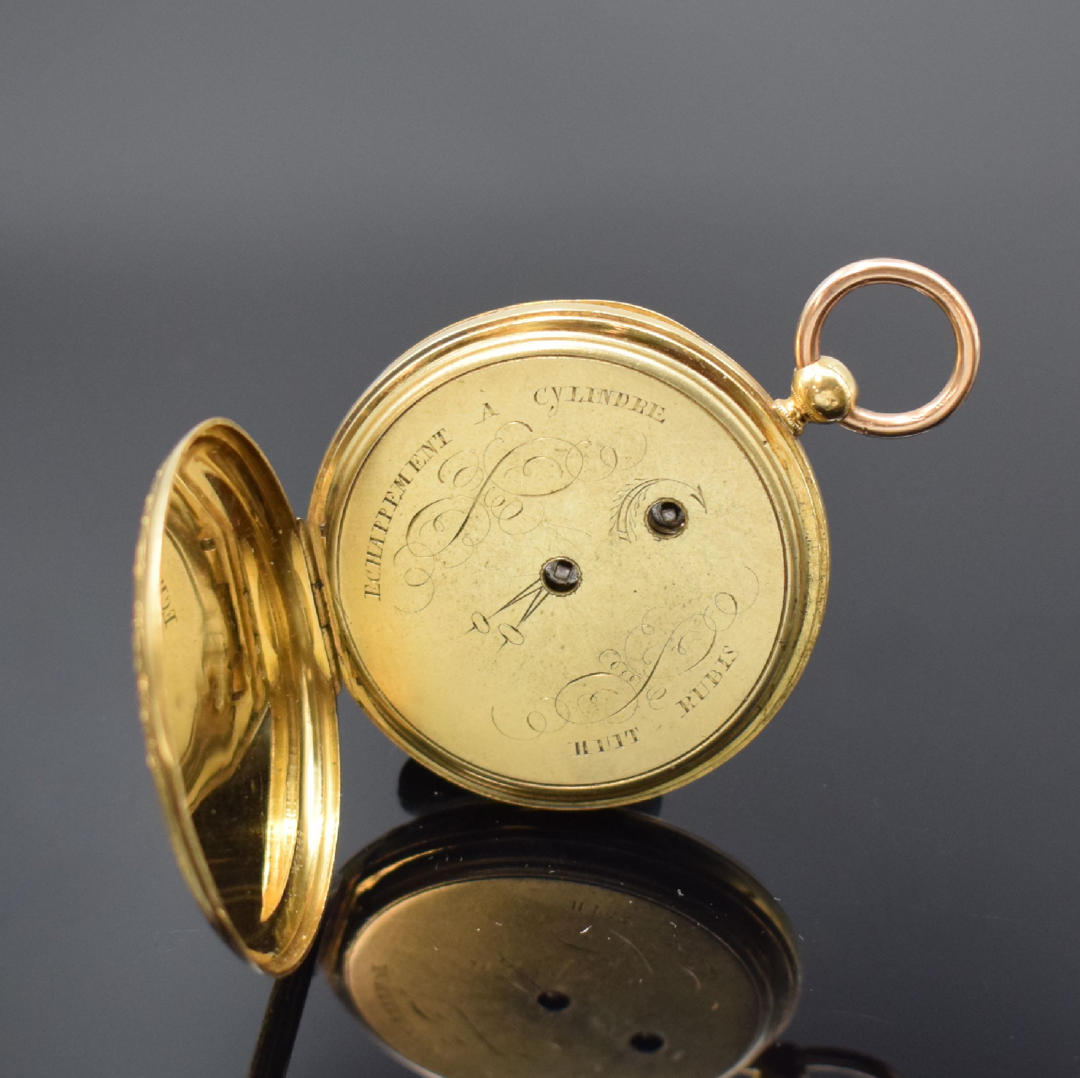 Detail c: Offene Taschenuhr in GG 750/000, Schweiz um 1870, Rückseite aufwend. grav. u. guill., Metallcuvette, Emailzifferbl. m. röm. Zahlen, gebl. Zeiger, ...