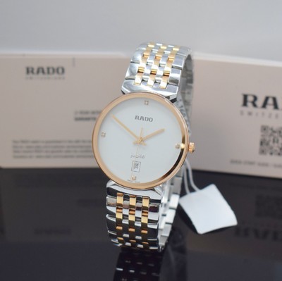 Image RADO ladies wristwatch series Florence reference R48912723, quartz, stainless steel case including bracelet with butterfly buckle partial gold-plated, sapphire crystal, snap on case back, silvered dial with 4 applied diamond indices, display of hours, minutes, sweep seconds & date, diameter approx. 38 mm, length approx. 21 cm, original box & blank papers, condition 1-2
