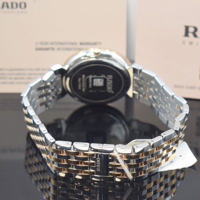 26639356b - RADO ladies wristwatch series Florence reference R48912723, quartz, stainless steel case including bracelet with butterfly buckle partial gold-plated, sapphire crystal, snap on case back, silvered dial with 4 applied diamond indices, display of hours, minutes, sweep seconds & date, diameter approx. 38 mm, length approx. 21 cm, original box & blank papers, condition 1-2