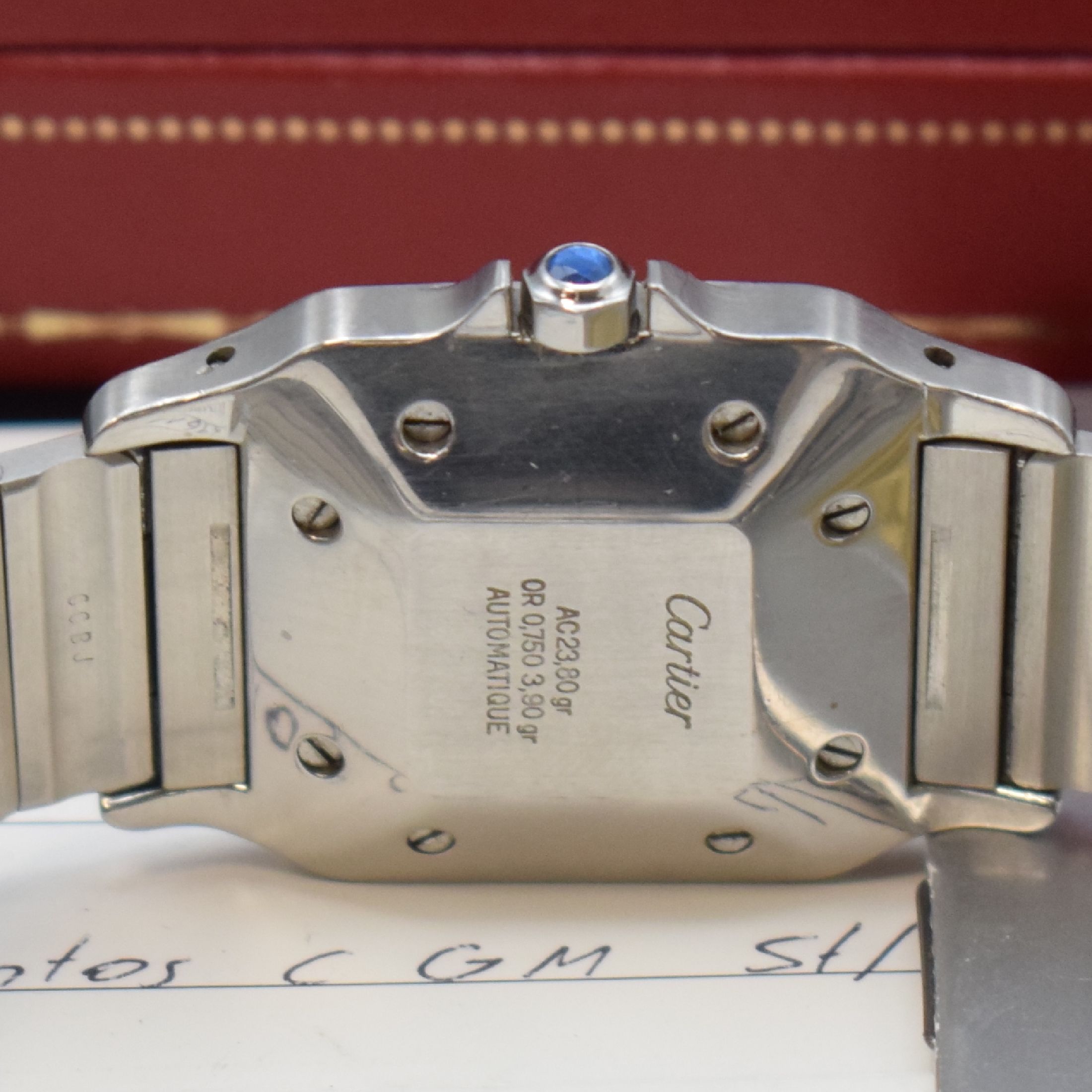 Detail d: CARTIER Santos Herrenarmbanduhr, Schweiz um 1985, Automatik, Edelstahl/Gold kombiniert inkl. Gliederband m. Faltschl., Monocoque- Geh., Lünette ...