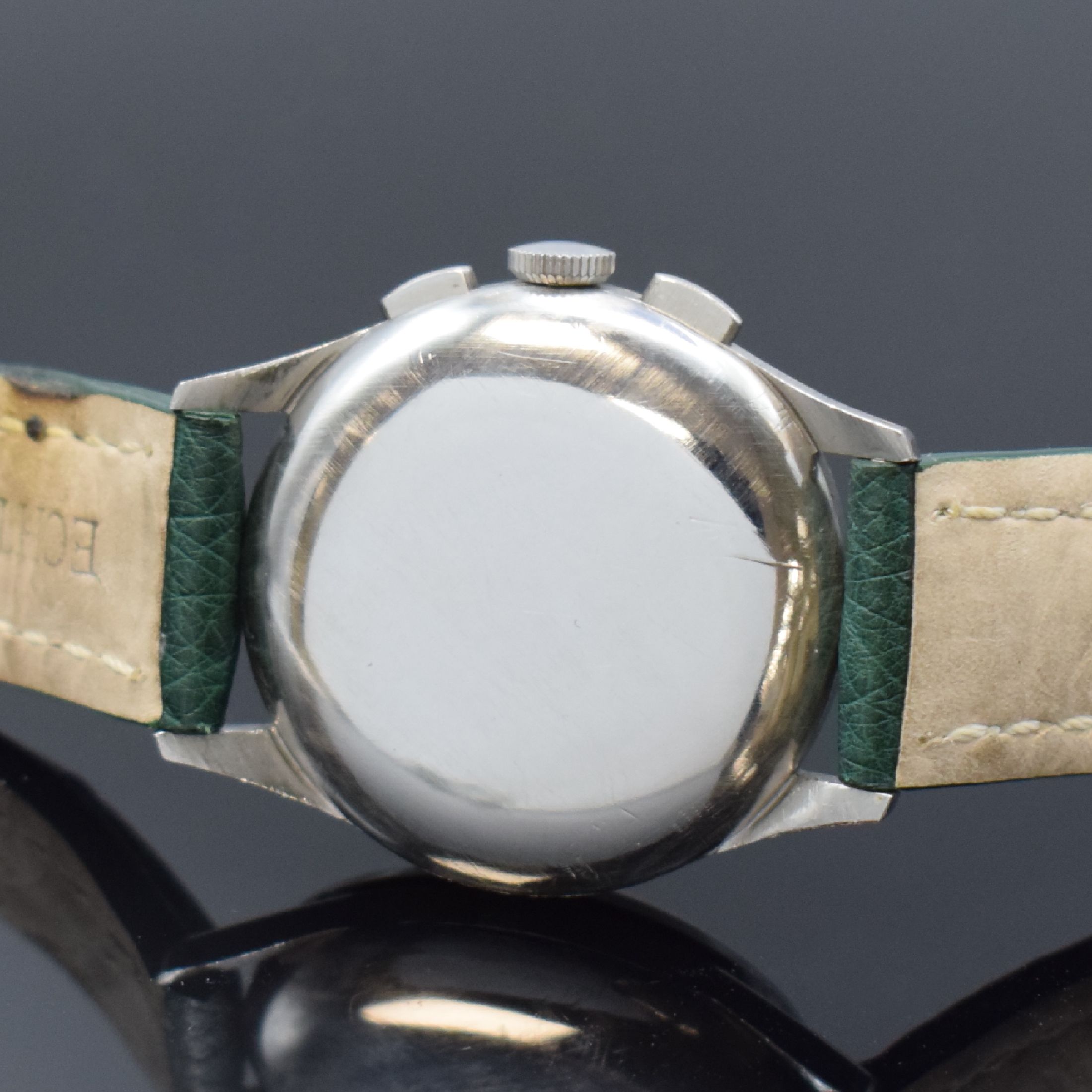 Detail c: TISSOT Herrenarmbanduhr mit Schaltradchronograph Referenz 6215-4 in Stahl mit Kaliber 27-41H, Schweiz um 1950, Handaufzug, 3-teil. Geh., Boden u. ...