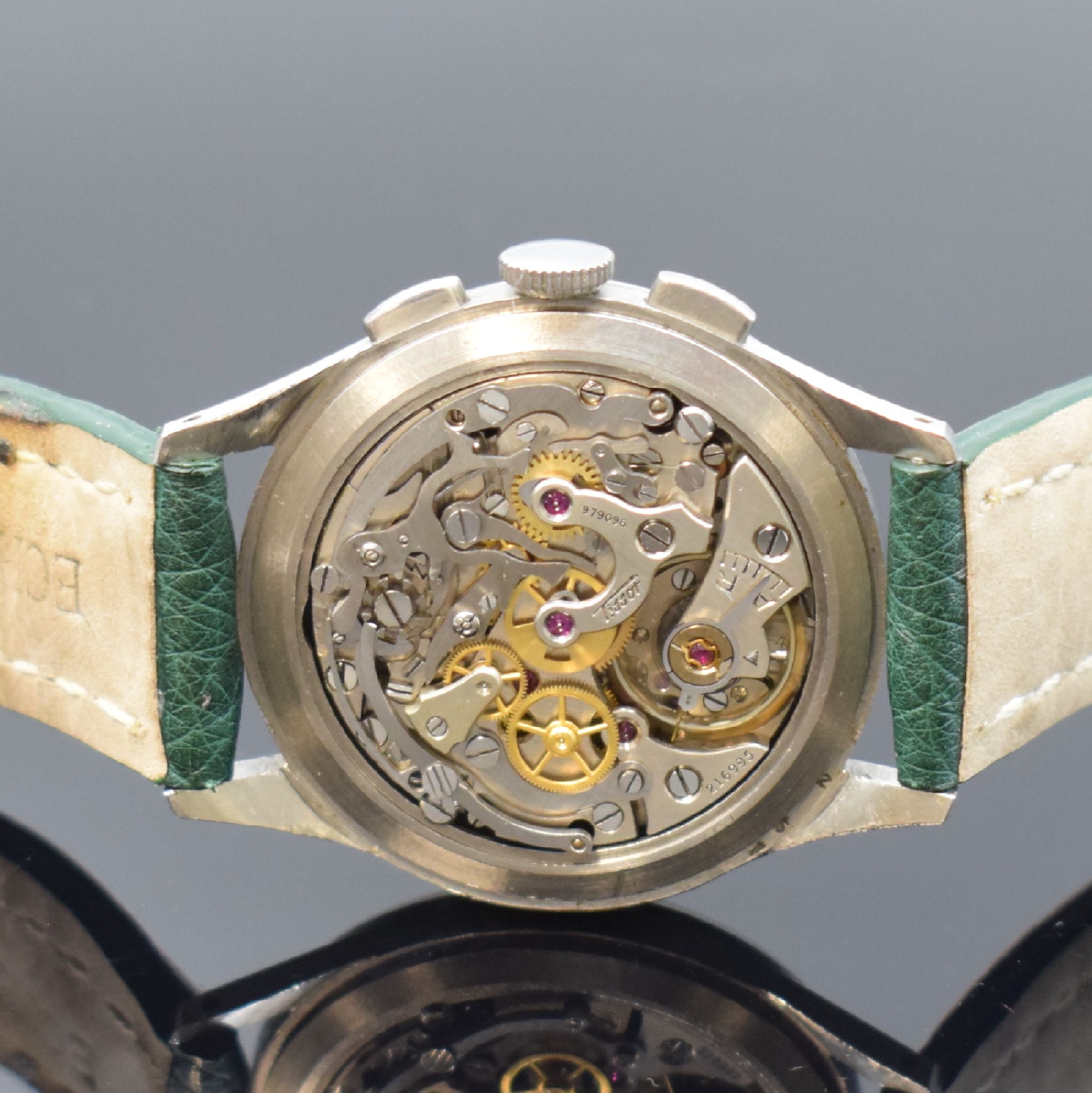 Detail d: TISSOT Herrenarmbanduhr mit Schaltradchronograph Referenz 6215-4 in Stahl mit Kaliber 27-41H, Schweiz um 1950, Handaufzug, 3-teil. Geh., Boden u. ...