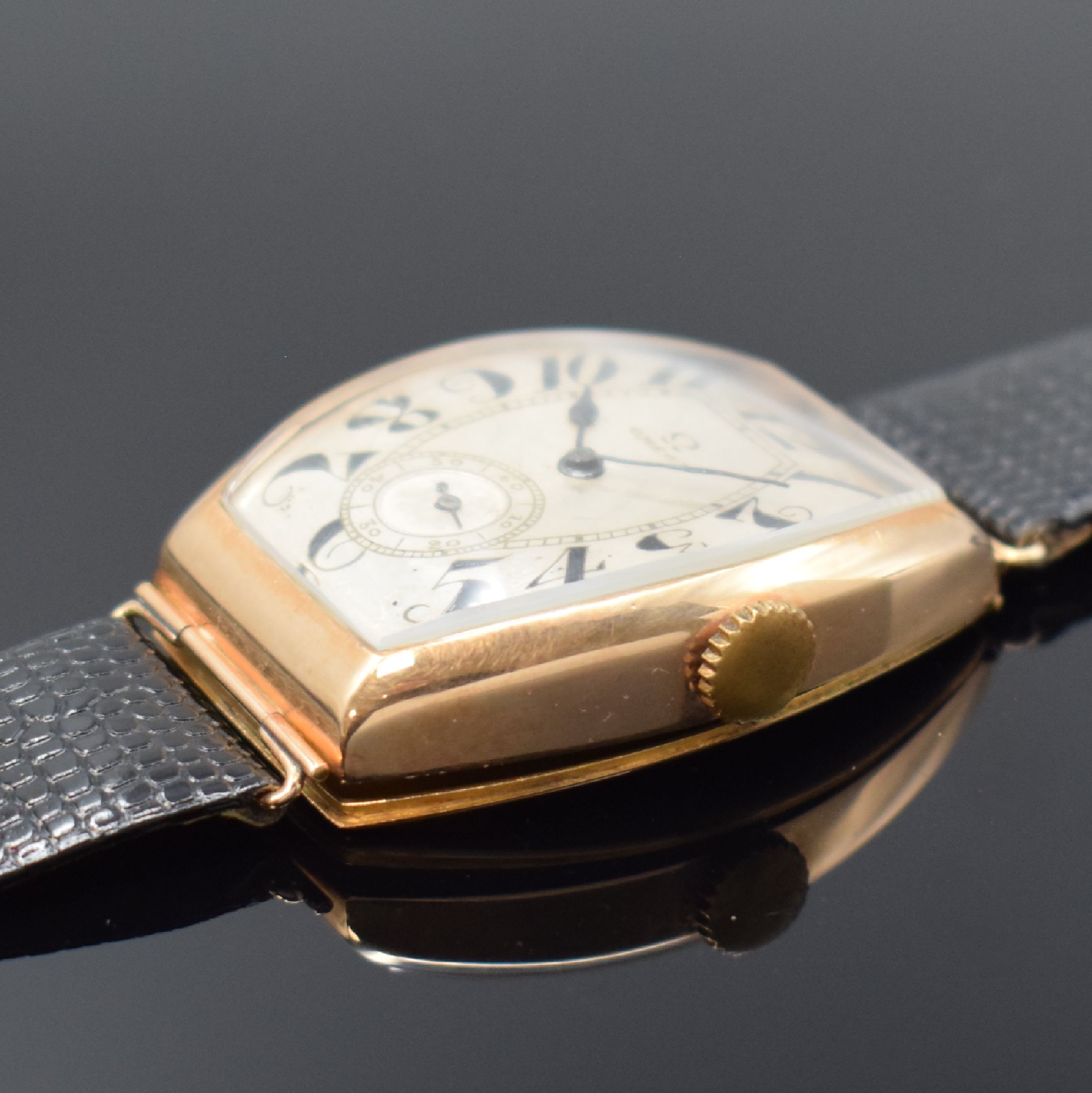 Detail b: OMEGA frühe Herrenarmbanduhr für den russischen Markt um 1915 in RG 583/000, Handaufzug, 2-teil., tonneauförm. Geh., in sich gewölbt, ...