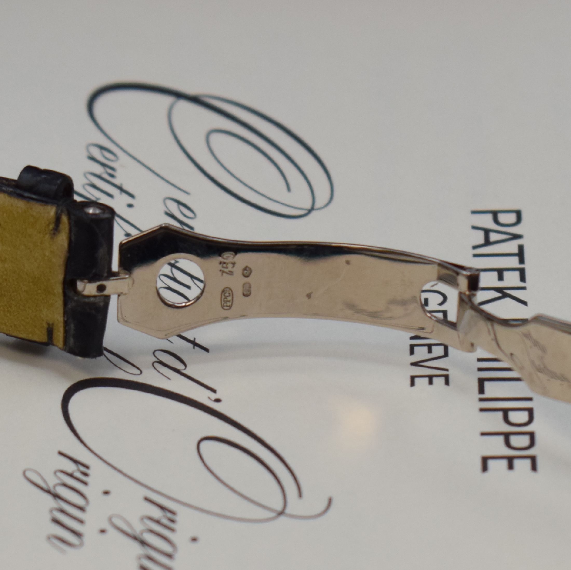 Detail d: PATEK PHILIPPE hochfeiner und seltener, astronomischer Jahreskalender in WG 750/000 Referenz 5146G-001, Automatik, beids. vergl., Boden verschr., ...