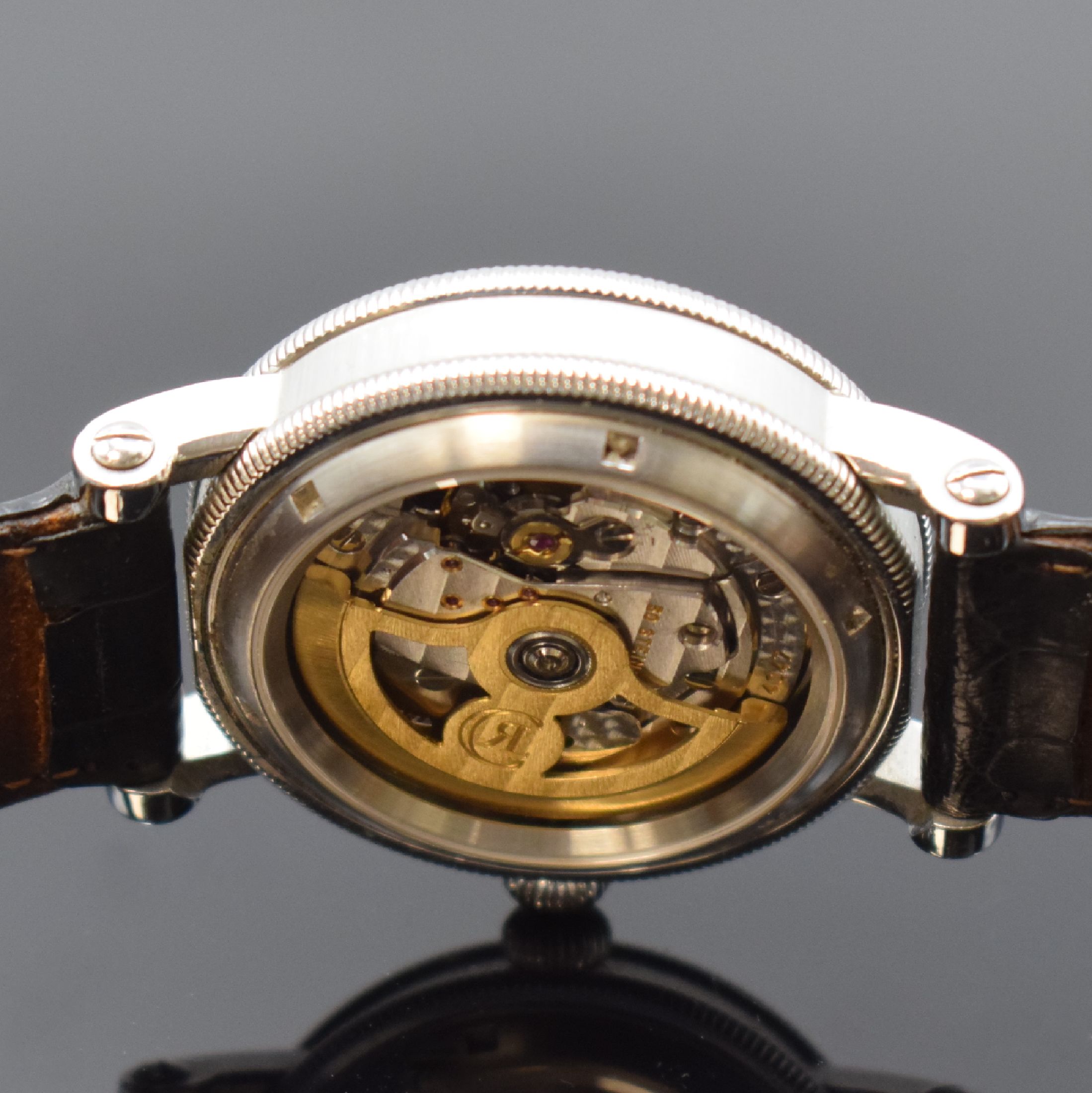 Detail e: CHRONOSWISS Delphis Herrenarmbanduhr in Edelstahl Referenz CH 1423, Schweiz um 2000, Automatik, beids. vergl. Geh., Boden geschr., Lederband m. ...