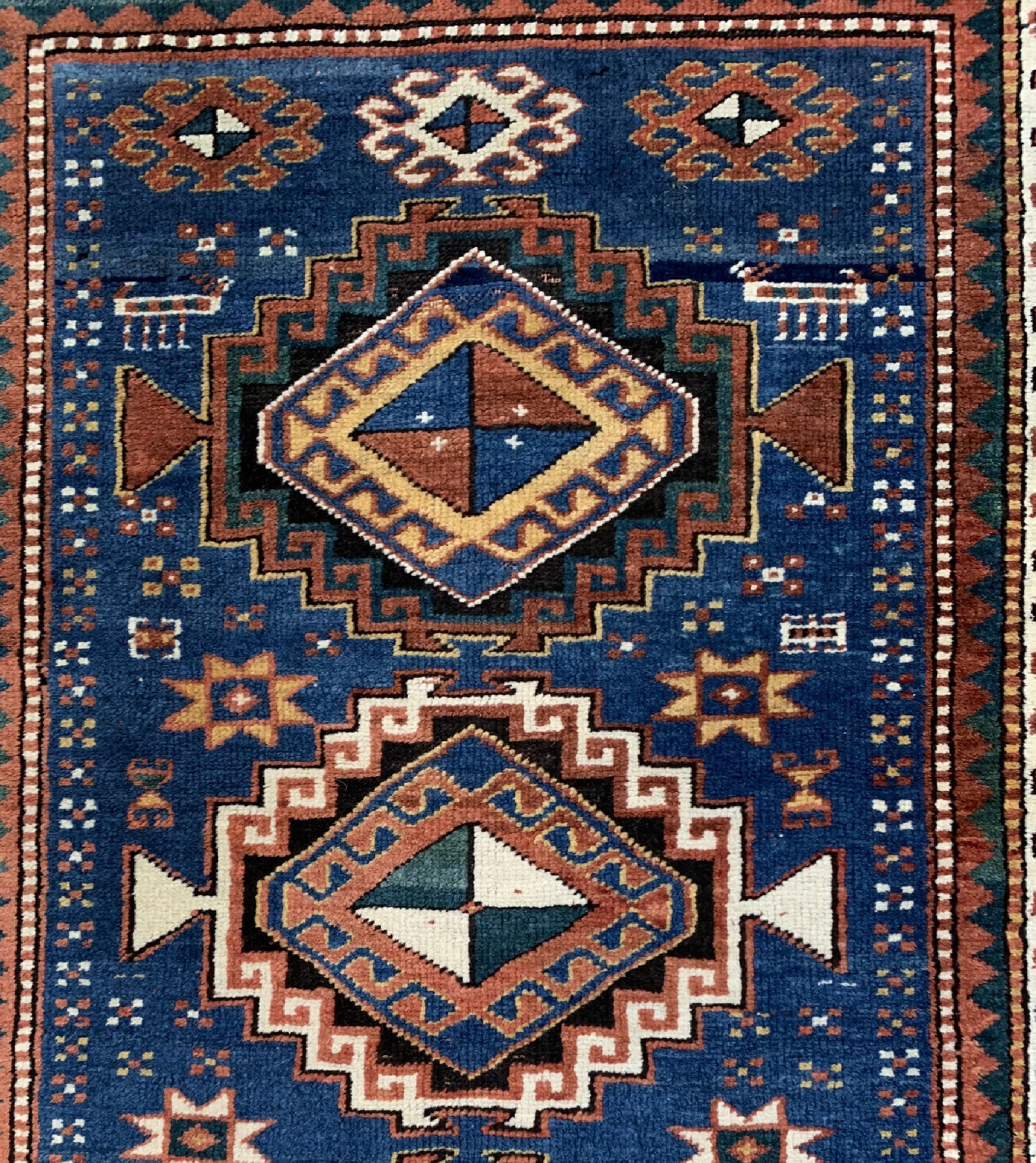 Detail b: Antiker Kazak, Kaukasus, 19.Jhd, Wolle auf Wolle, ca. 180 x 97 cm, EHZ: 2-3