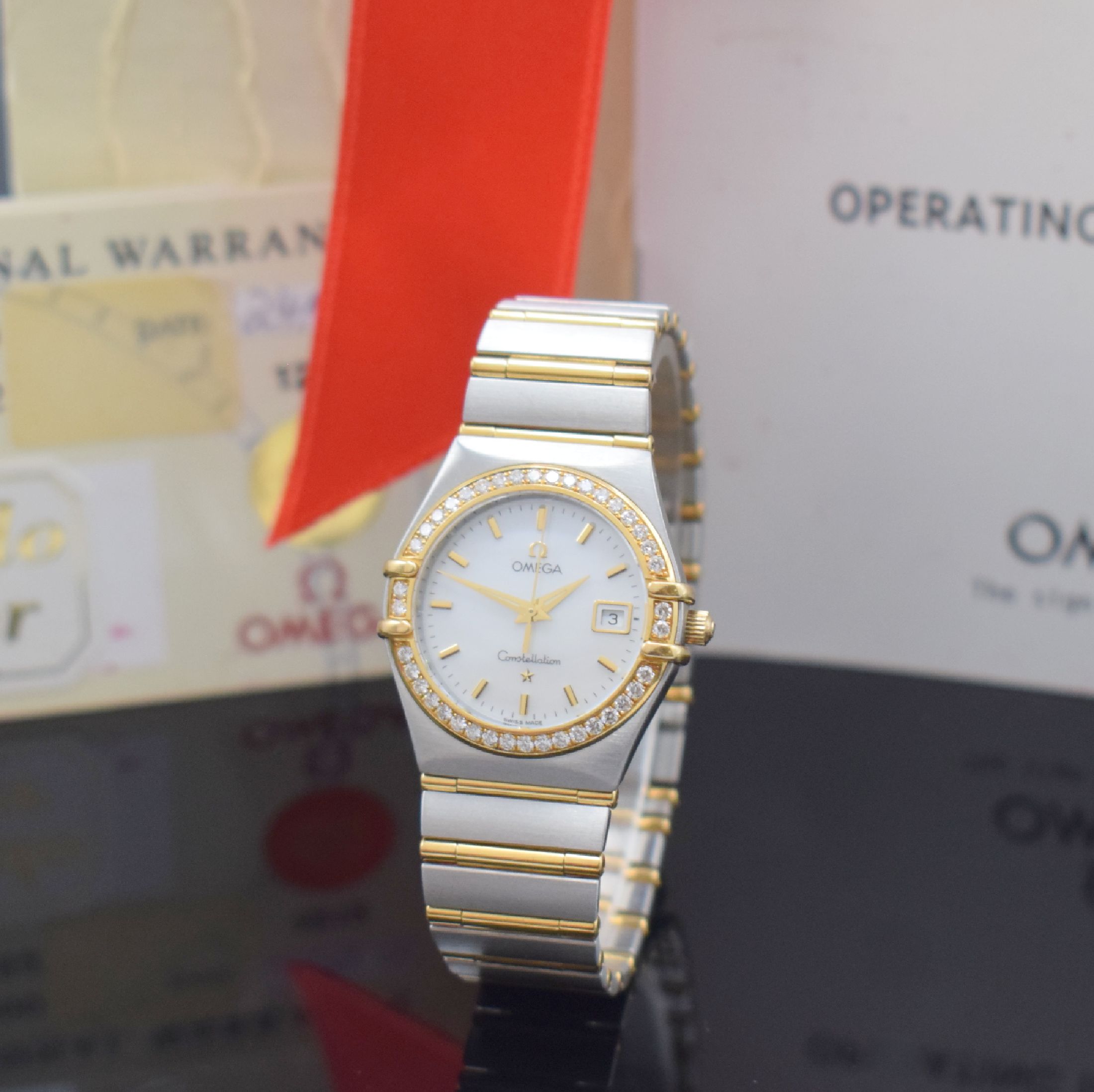 OMEGA Damenarmbanduhr Serie Constellation Referenz 1287.70.00, quarz, Edelstahl/Gold kombiniert inkl. Gliederband m. Faltschl., Boden m. Darst. ...