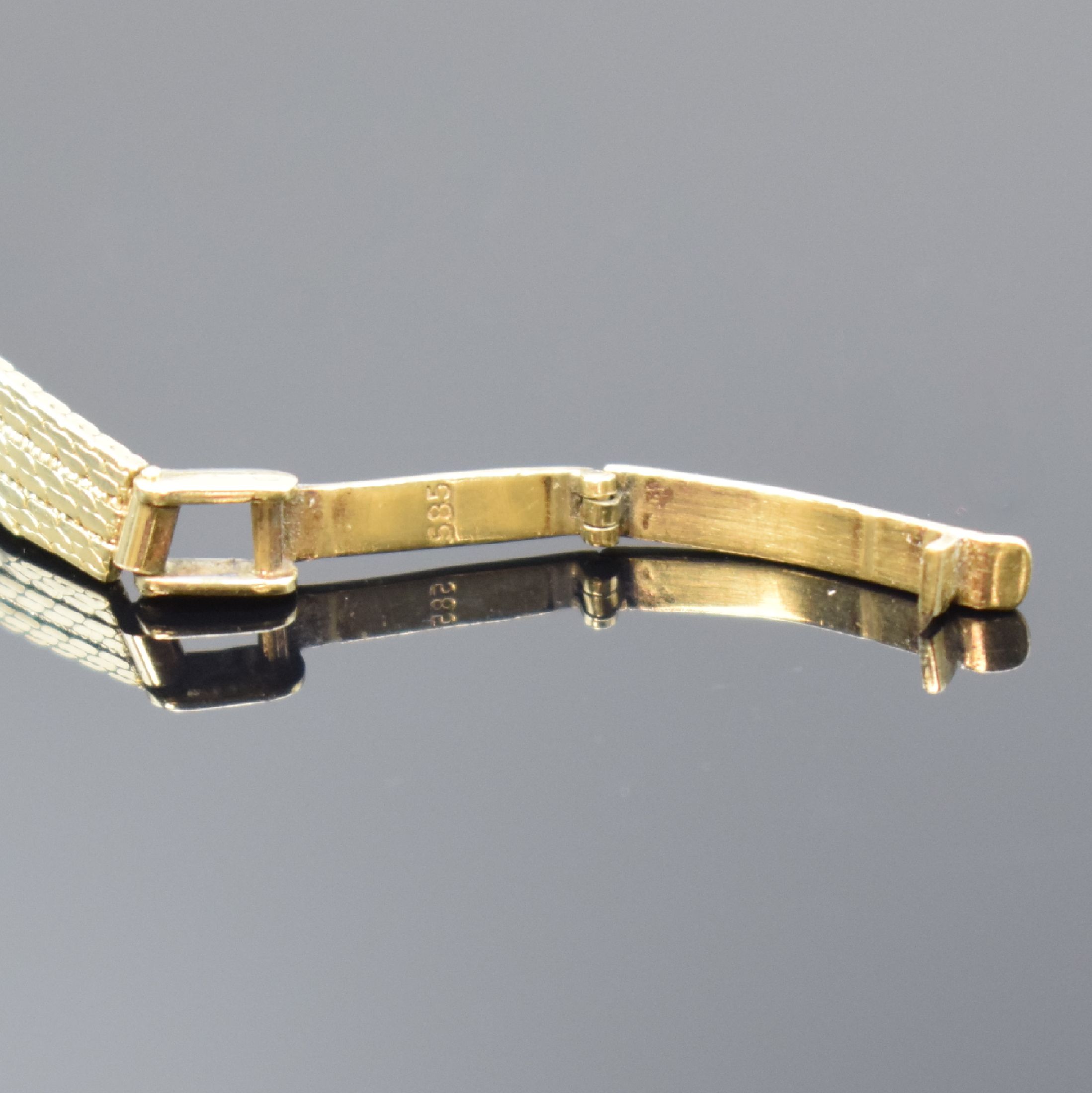 Detail b: AMARA Damenarmbanduhr in GG 585/000, Handaufzug, Schweiz um 1970, Boden aufgedr., verg. Strukturzifferbl., Anz. v. Std. und Min., Goldband def./zu ...