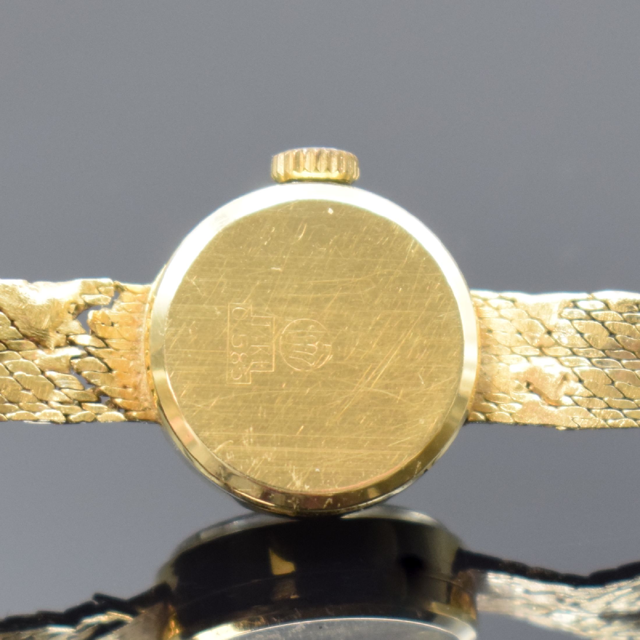 Detail c: AMARA Damenarmbanduhr in GG 585/000, Handaufzug, Schweiz um 1970, Boden aufgedr., verg. Strukturzifferbl., Anz. v. Std. und Min., Goldband def./zu ...