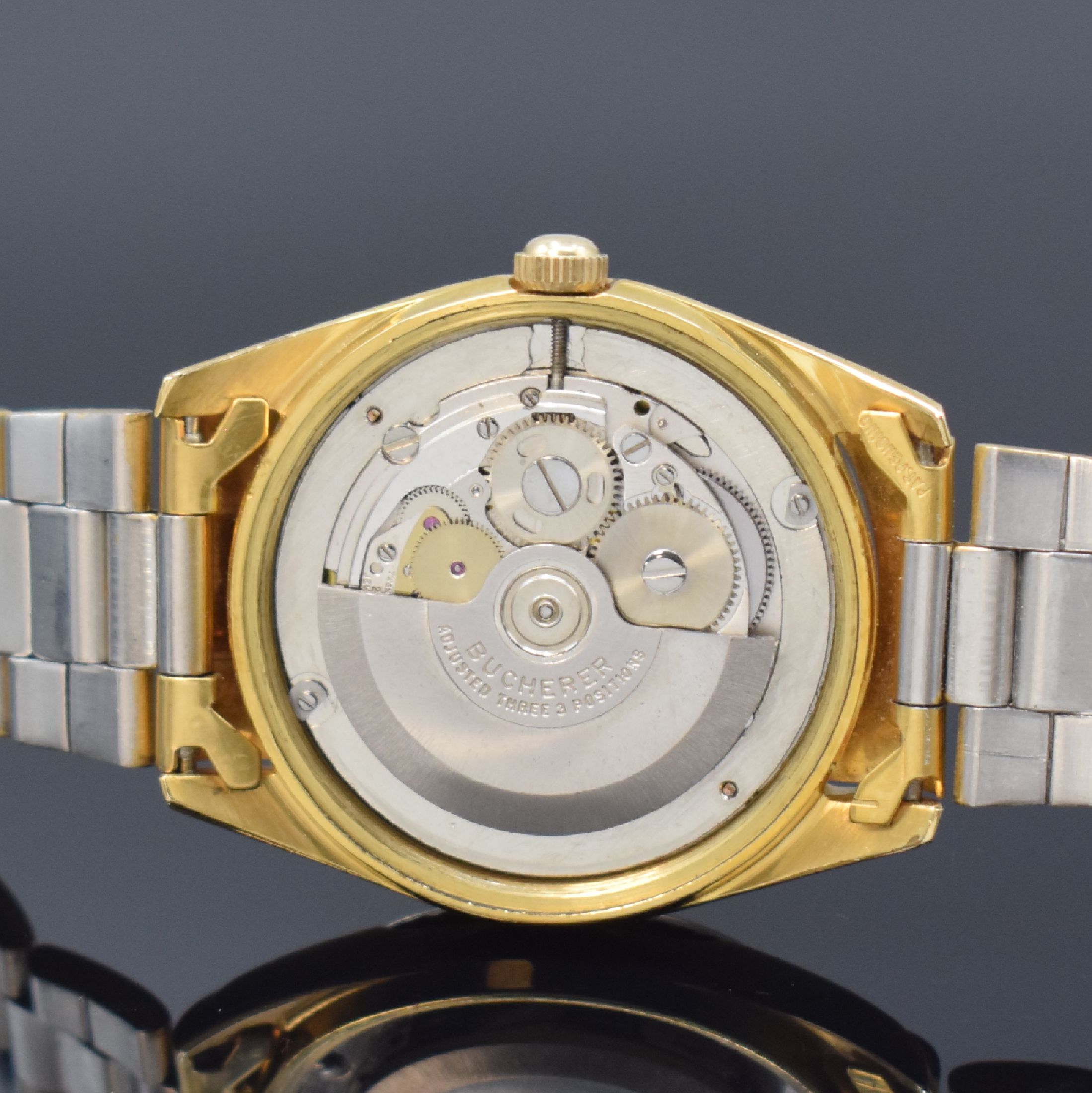 Detail d: BUCHERER Herrenarmbanduhr Weekday Referenz 30 139, Automatik, Schweiz um 1968, verg. Geh. inkl. Gliederband Faltschl., Edelstahlboden m. ...