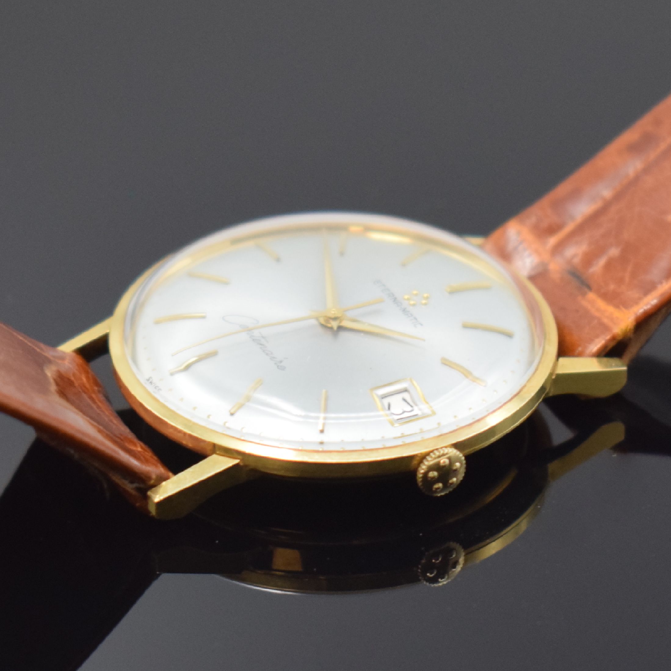 Detail c: ETERNA Centenaire Herrenarmbanduhr in GG 750/000, Automatik, Schweiz um 1965, 3-teil. Geh. inkl. orig. Lederband m. verg. orig. Dornschl., orig. Glas ...