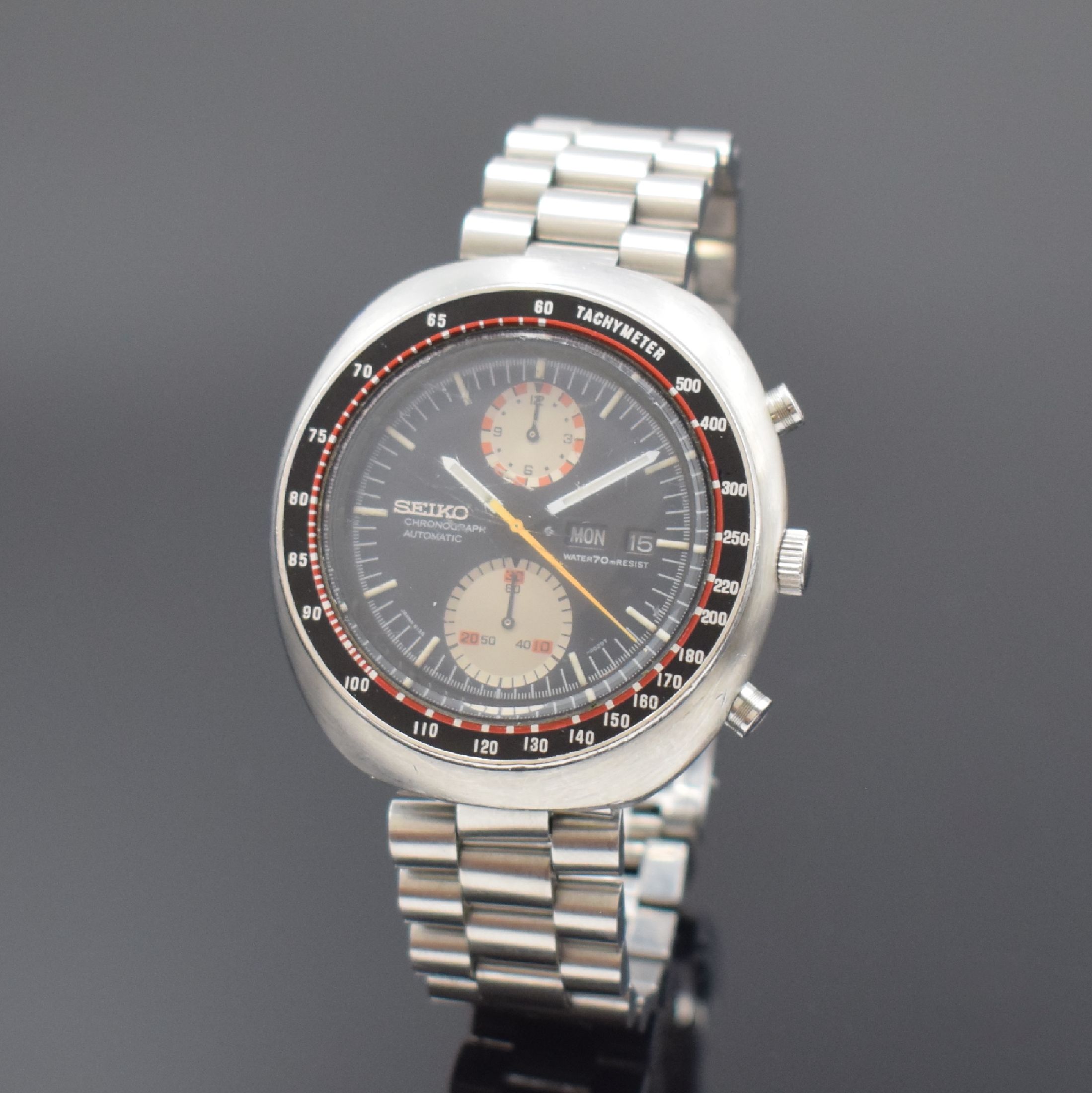 SEIKO Schaltradchronograph in Stahl Referenz 6138-0011, Automatik, Japan um 1975, verschr. Geh. am orig. Gliederband m. Faltschl., schwarz/rote ...