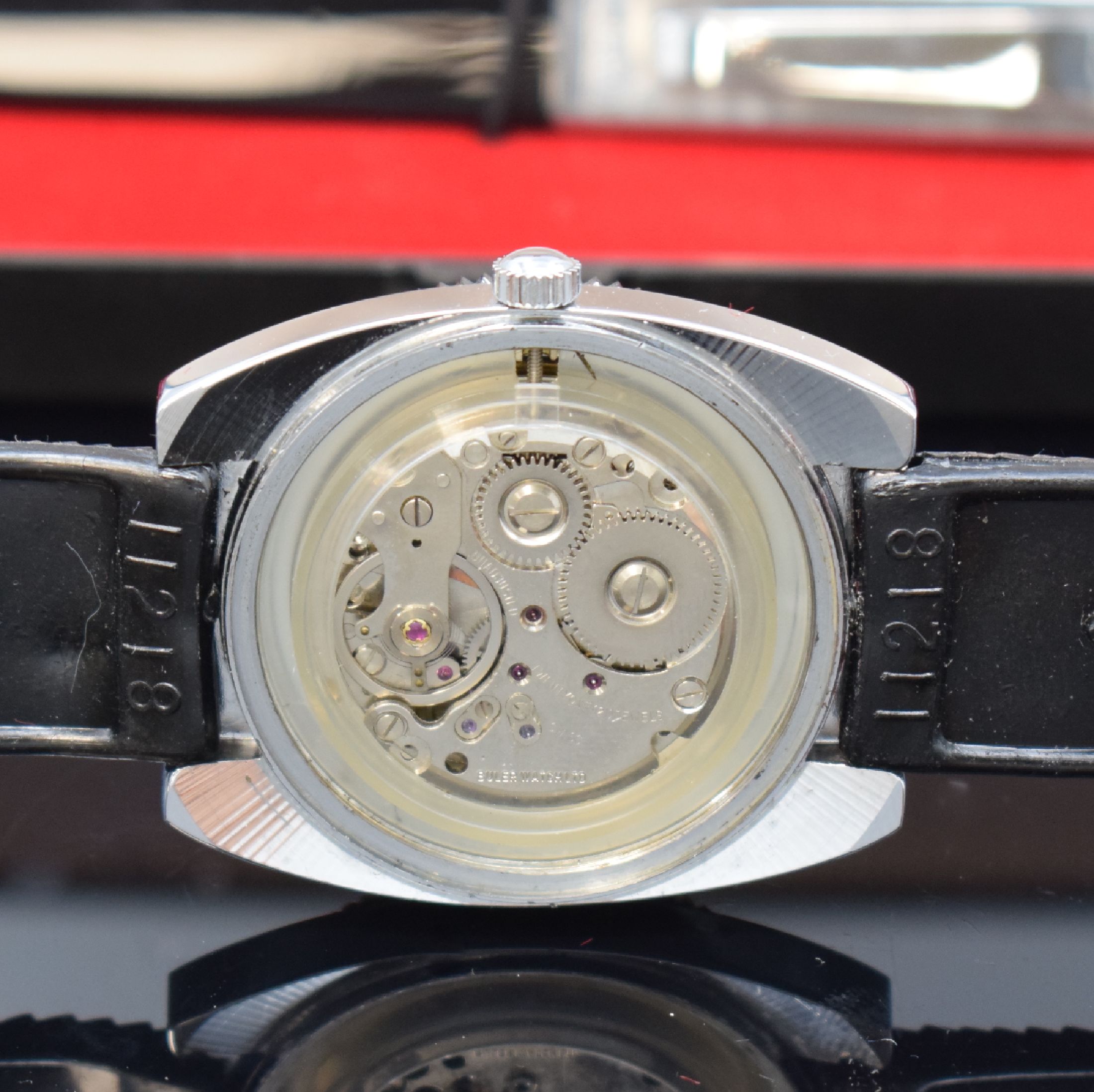Detail d: BULER Armbanduhr im Taucherdesign, Handaufzug, Schweiz um 1970, verchr. Geh., Edelstahlboden verschr., Lünette m. 60er Teilung beids. drehb., ...