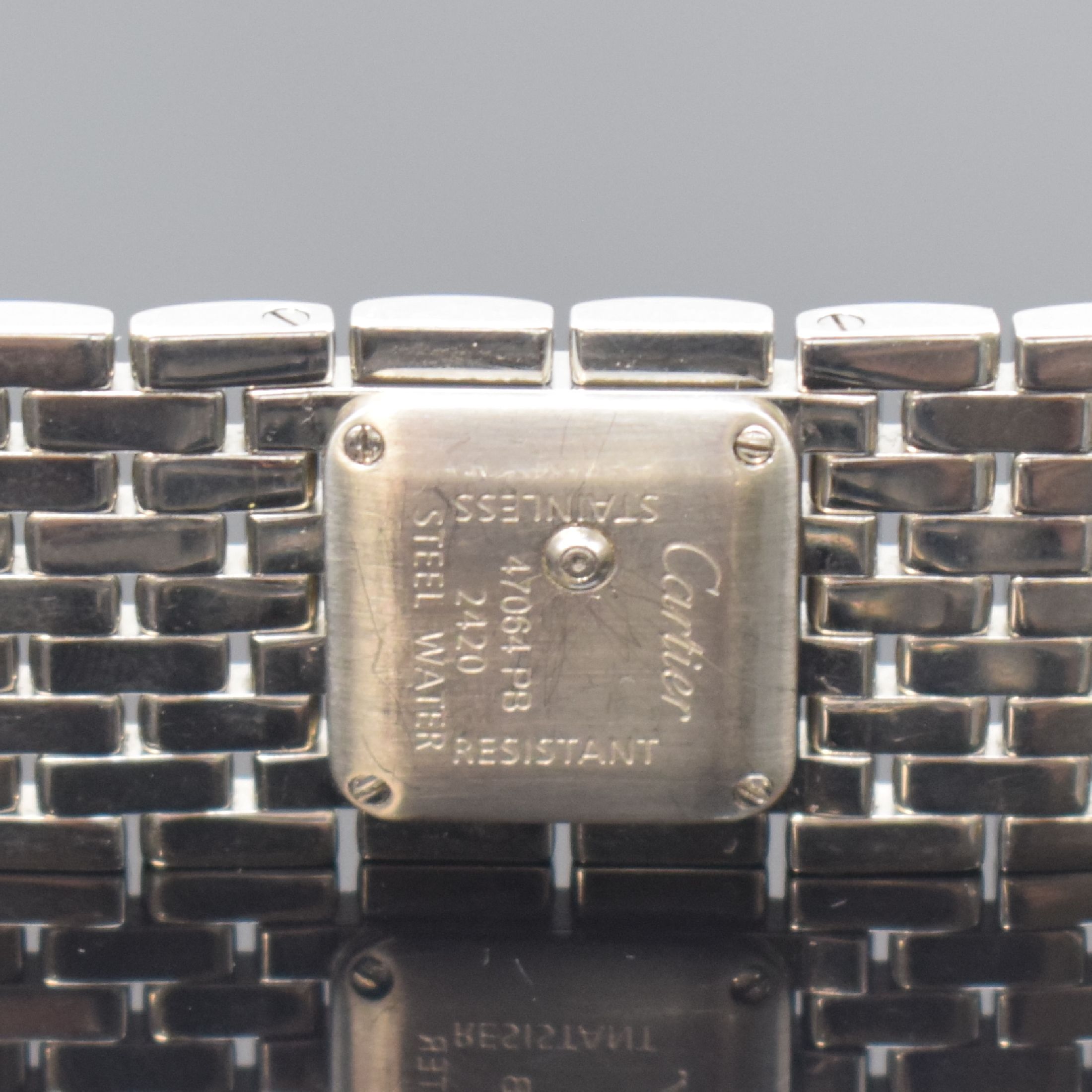 Detail c: CARTIER Panthere Manchette Ruban Damenuhr in Stahl, Schweiz um 2000, quartz, 9-reihiges feines Gliederband m. Doppelfaltschl., darin einges. ...