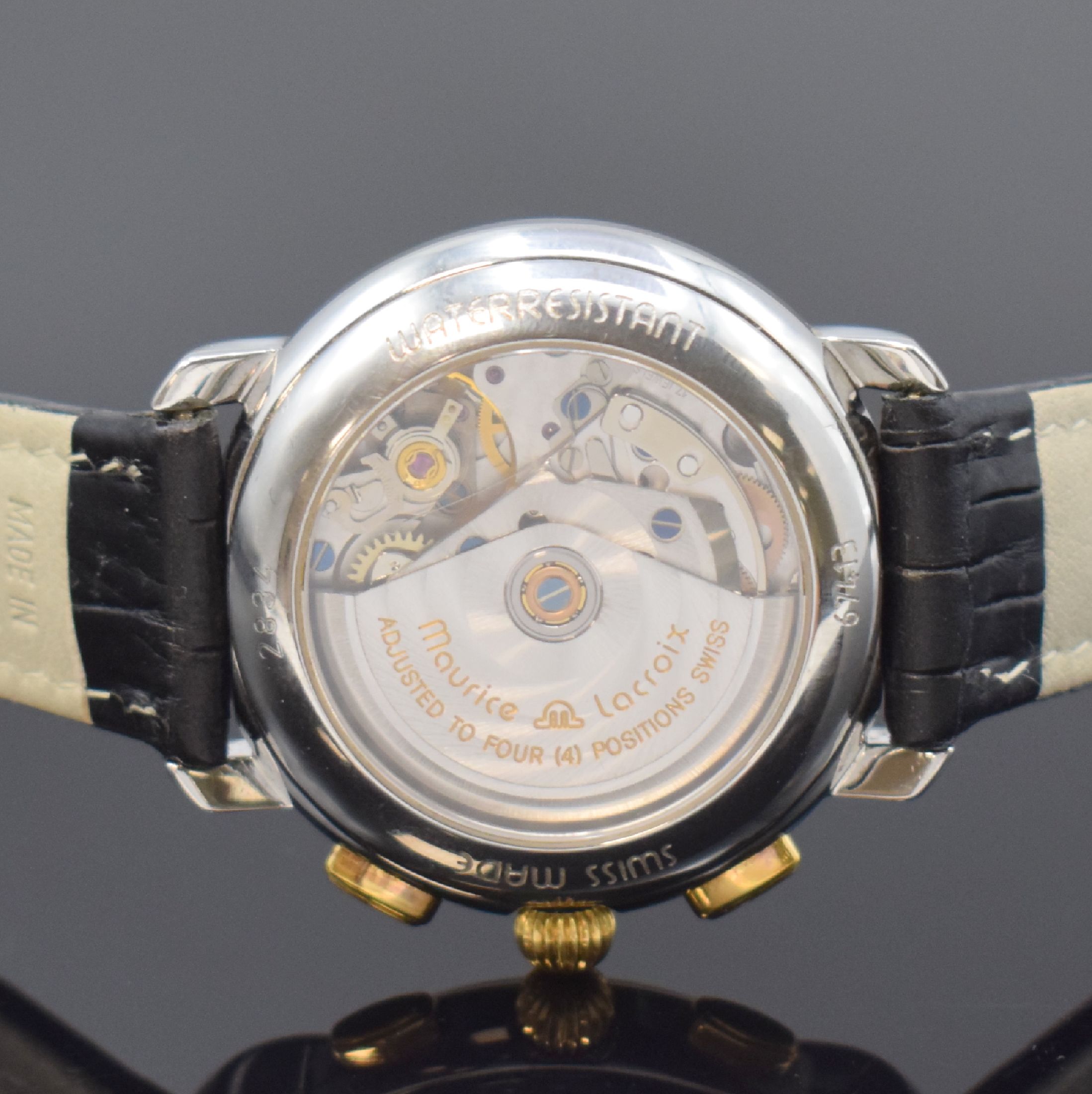 Detail d: MAURICE LACROIX Armbandchronograph, Schweiz um 1995, Automatik, beids. vergl. Stahlgeh. z. T. verg., Boden aufgedr., silb. transluzid lack. ...