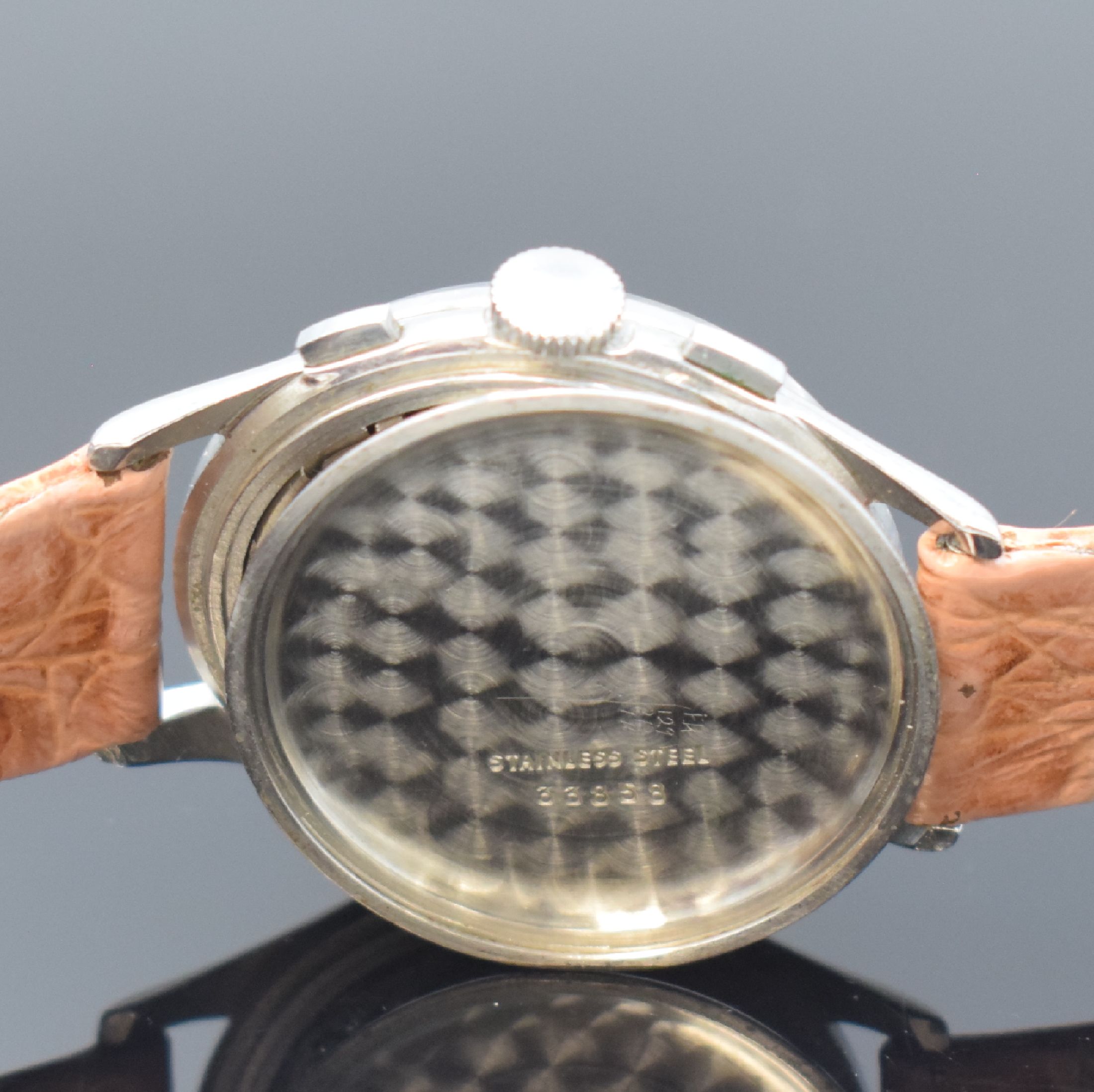 Detail e: TECHNICUM CANTONAL BIENNE sehr seltener Valjoux 72 Armbandchronograph in Stahl, Schweiz um 1950, Handaufzug, 3-tlg. Geh., Boden u. Glasrand aufgedr., ...